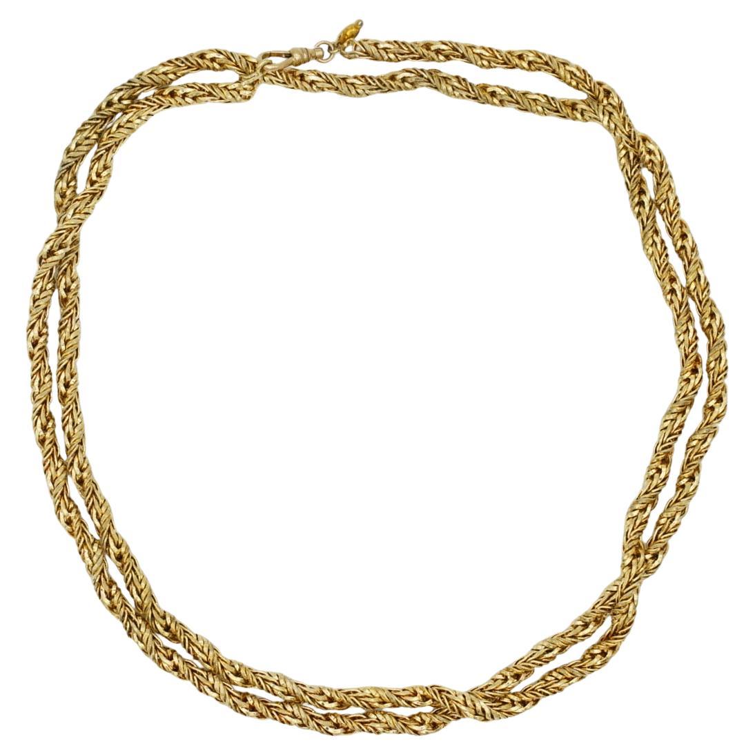 Christian Dior GROSSE Collar largo de cuerda trenzada unisex vintage, modernista y versátil, tono dorado

Muy buen estado. Ligeros arañazos o pérdida de color.  100% auténtico.

Una pieza única. Firmado en el cierre.

También se puede llevar como