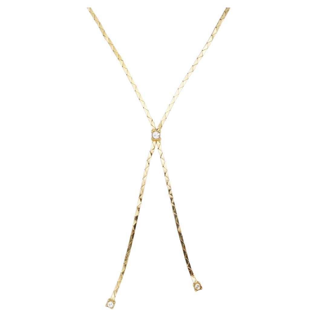 Christian Dior GROSSE Vintage 1970s Long Chain Butterfly Crystal Y Tassel Elegant Modernist Necklace, Gold Tone

Very excellent condition. 100% genuine.

Very beautiful. A unique piece. Signed at clasp.

Material: Gold plated metal,