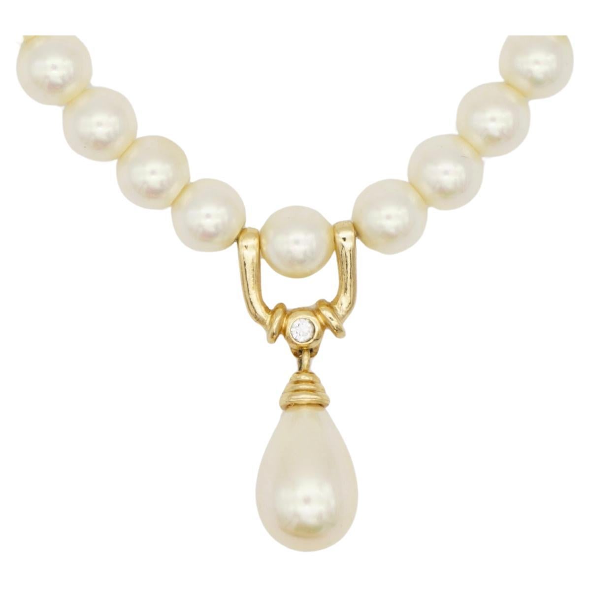 Christian Dior GROSSE Whole White Round Pearls Door knock Tear Water Drop Pendant Crystal Necklace, Gold Plated

Very good condition. Maybe light scratches, barely noticeable. 100% Genuine. 

Marked at clasp. Very rare to find.

Materials: Gold