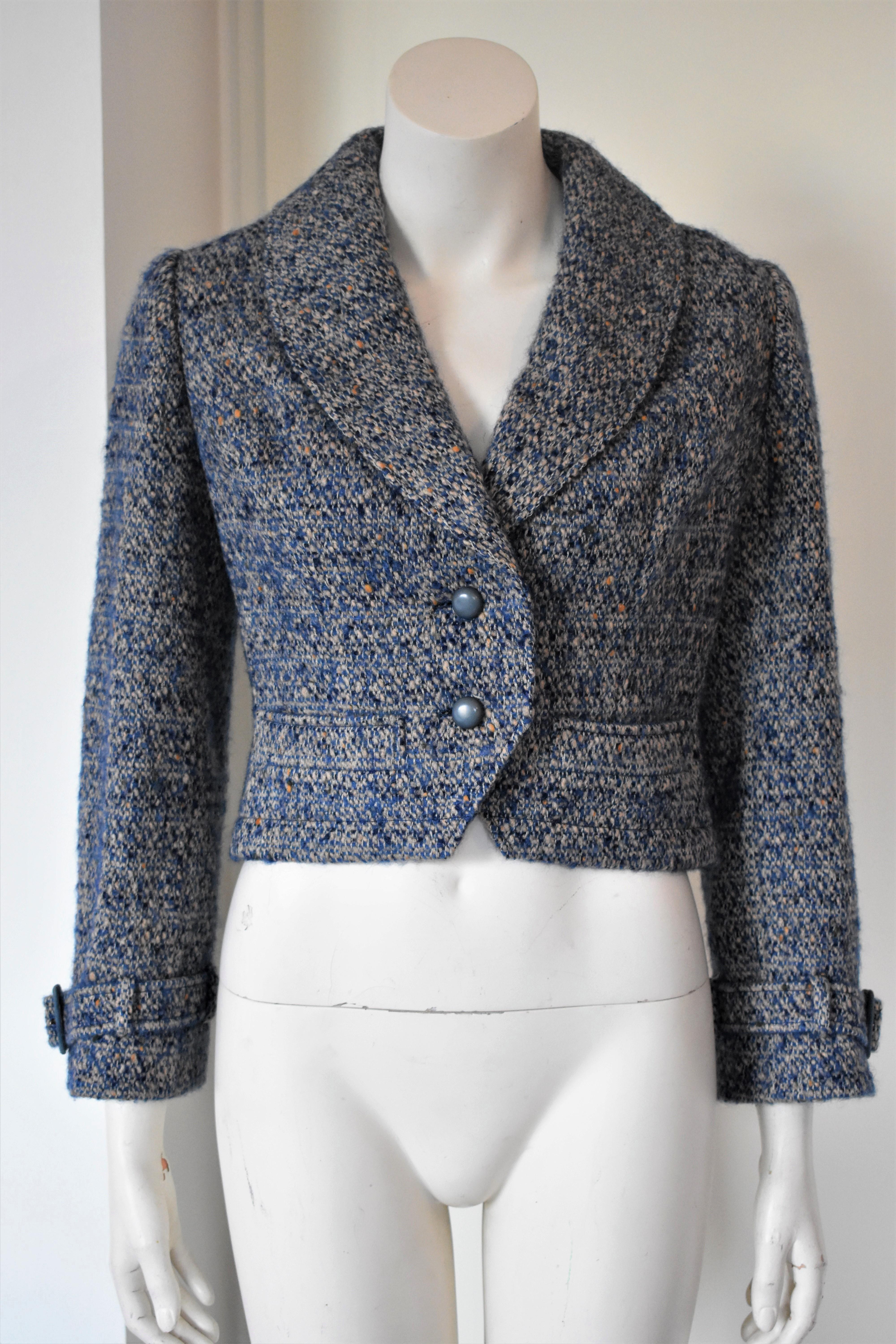 This Christian Dior jacket is a beautiful Haute Couture piece from the 1975 Automne-Hiver collection, numbered 005427. The jacket is made from a soft blend of mohair and wool and it is fully lined with blue silk. The jacket is in an excellent