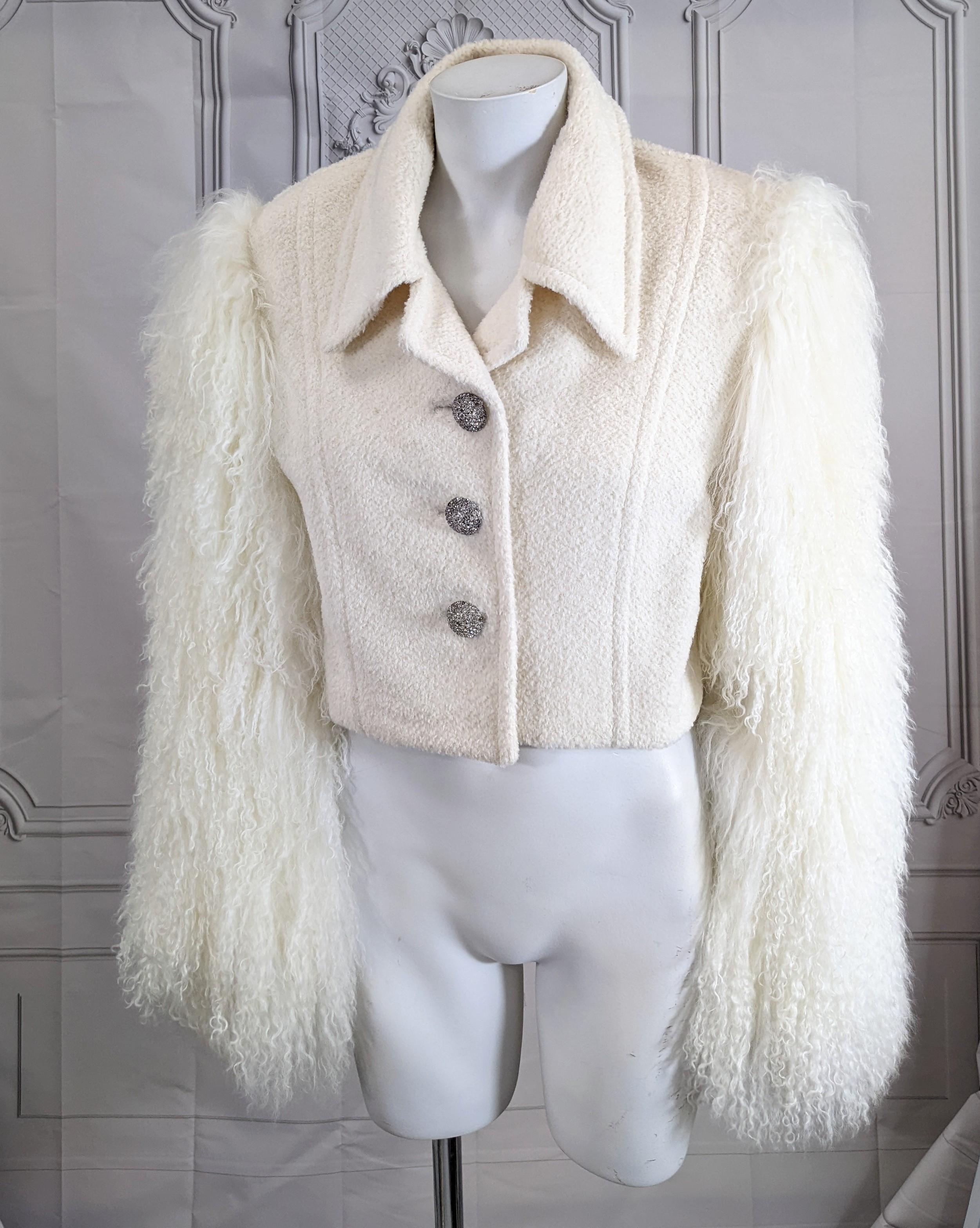 Christian Dior Haute Couture by Gianfranco Ferre of ivory mohair wool with Mongolian Lamb Sleeves. Cropped fitted shape. Handmade rhinestone dome buttons by Maison Goossens. 
Tiny, Small size, no label from a prominent NY socialite. 
DOMESTIC SALES