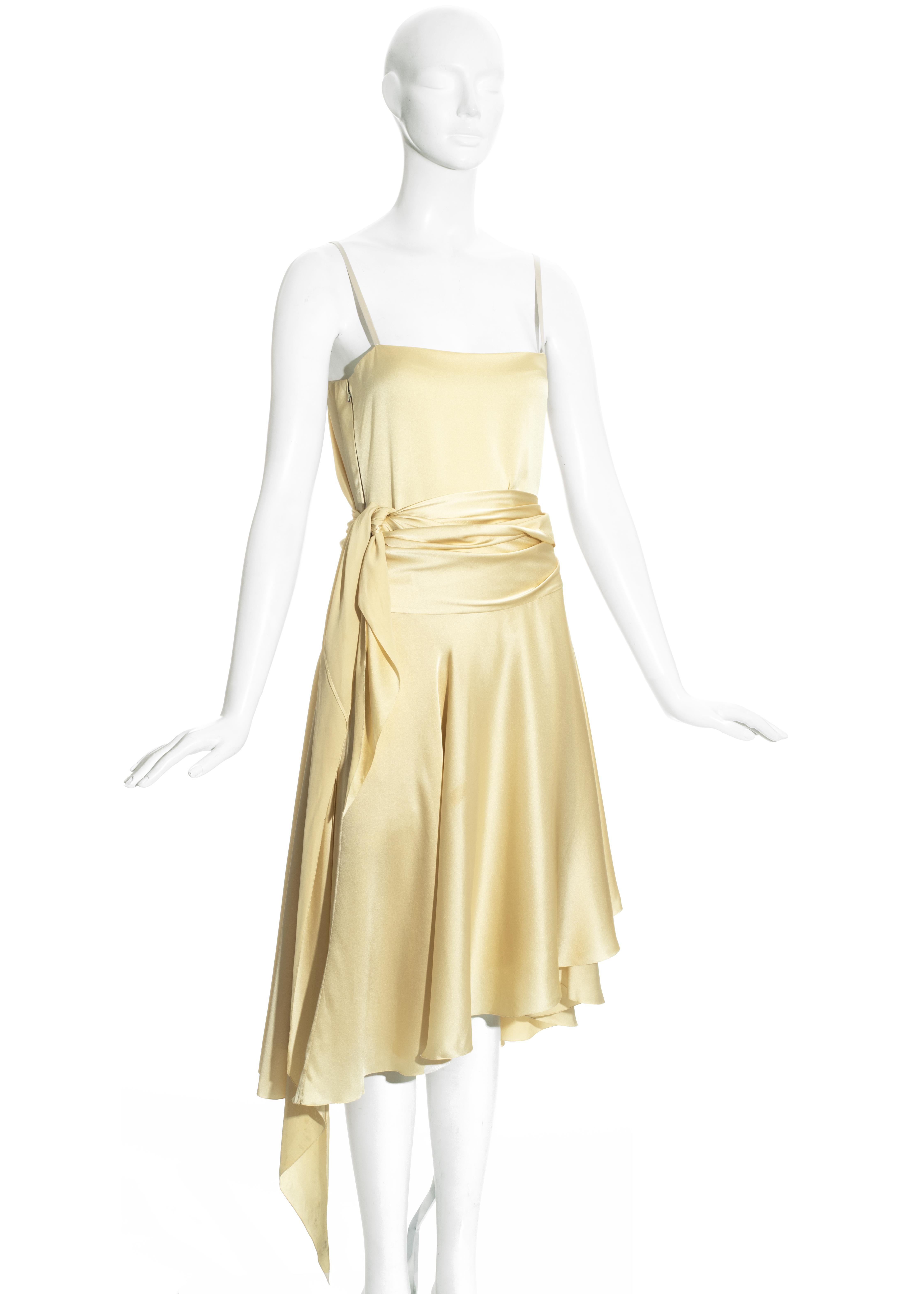Christian Dior: Haute Couture by Marc Bohan cream silk two piece, slip dress and flounced wrap skirt.

Fall-Winter 1978