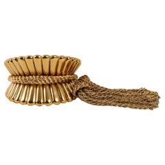Vintage Christian Dior Haute Couture Cuff Holding Two Golden Metal Pompoms