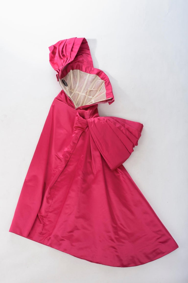 Circa 1959-1965
France

Exceptional raspberry satin silk grand soir dress by Christian Dior Haute Couture numbered 218551 . Very Closed to  the named Athena dress from the period of Yves Mathieu Saint-Laurent's assistantship with Monsieur Dior or