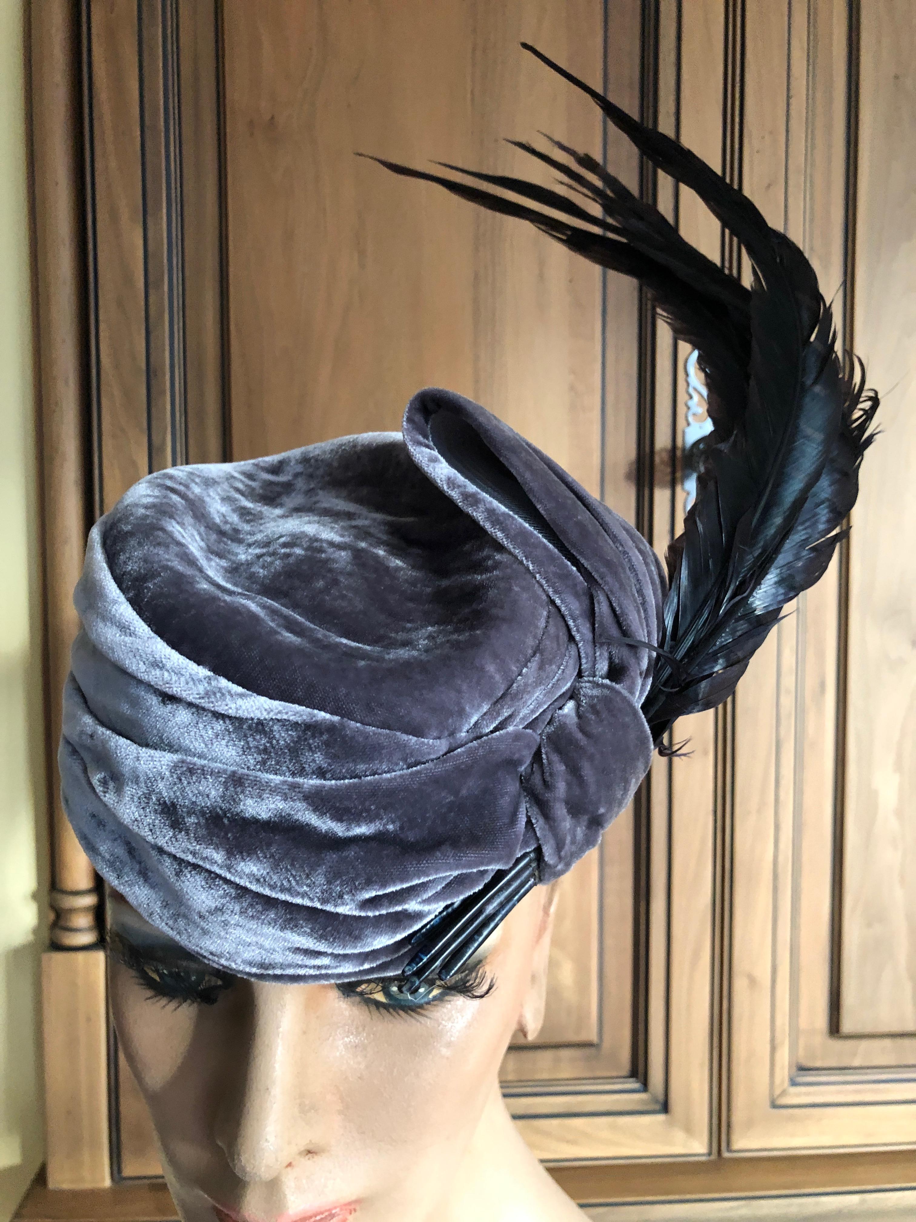 Christian Dior Haute Couture Feathered Hat by Stephen Jones for John Galliano.
So beautiful, dove gray velvet with huge swooping feathers.
Tag reads 57
In excellent condition