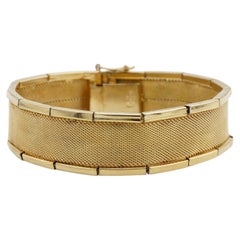 Christian Dior – Kultiges „GROSSE 1960“-Armband aus goldfarbenem, geripptem Geflecht mit zwei Stäben