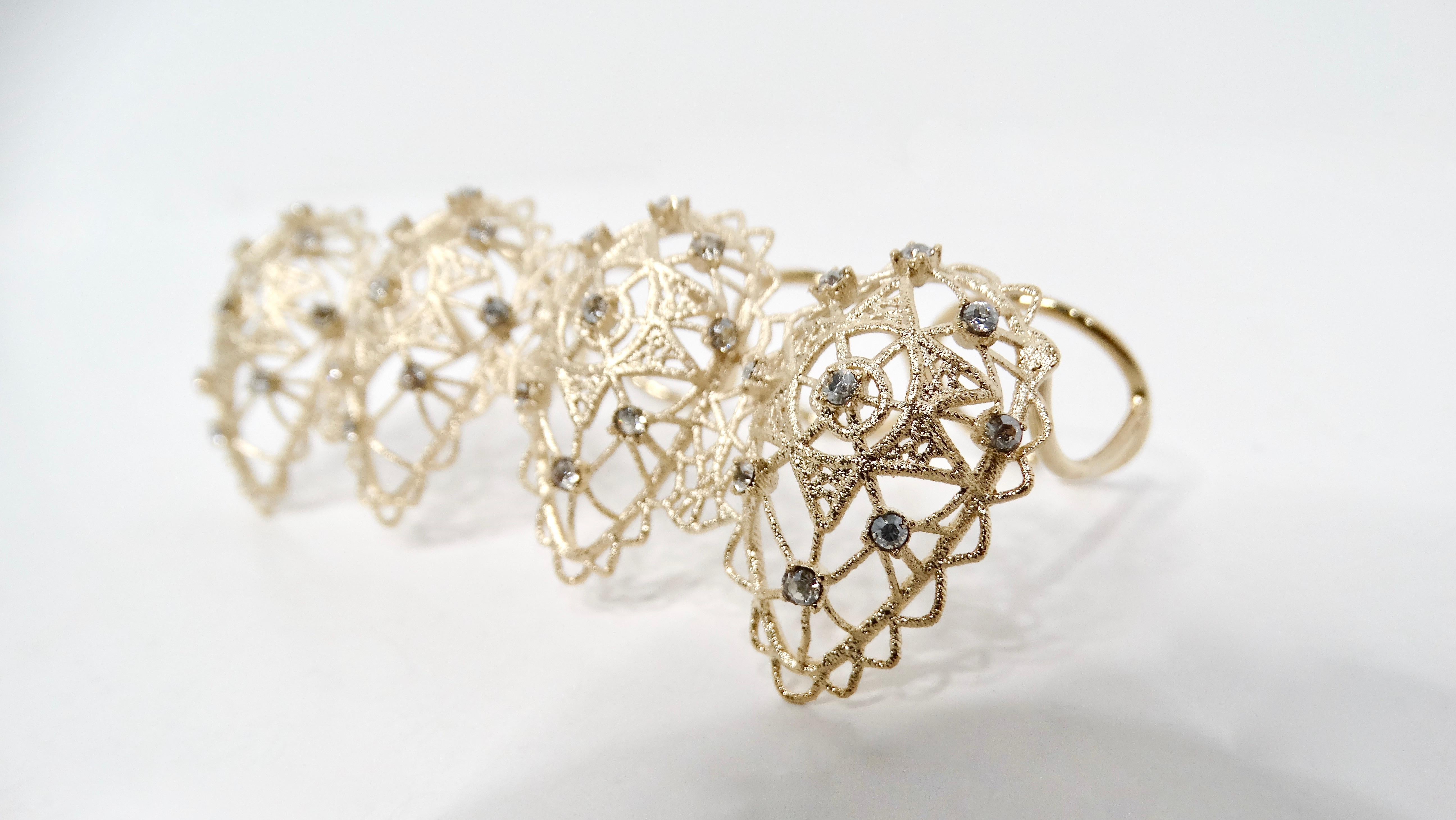 Christian Dior Intricate Crystal Detailed Gold-Tone Four-Finger Statement Ring 1