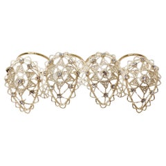 Christian Dior, bague fantaisie à quatre branches en cristal complexe et détaillée, couleur or