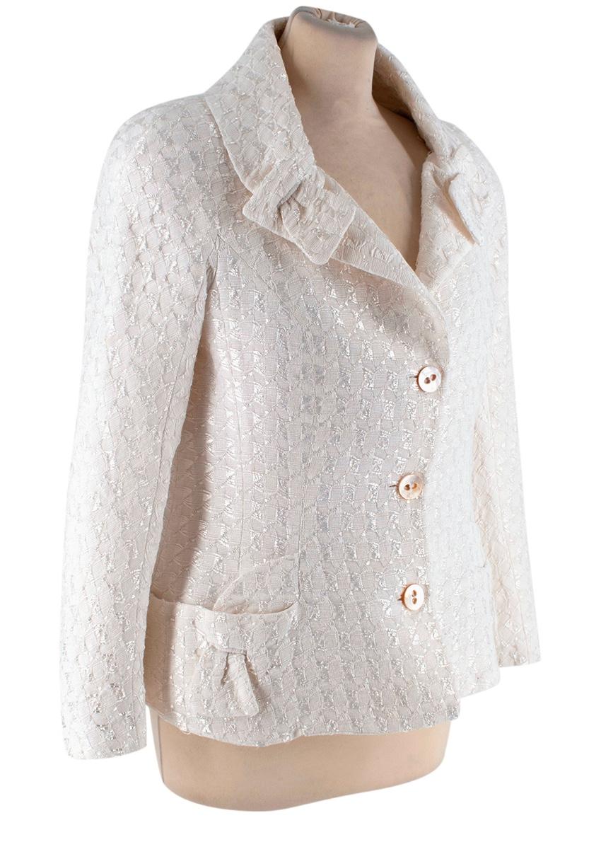 Christian Dior Ivory Cotton Blend Textured Bar Jacket

-Made of a soft textured cotton blend jacquard 
-Classic ever changing but defining hourglass cut
-Bow like detail to the collar and pockets
-Branded buttons 
-Luxurious silk lining 
-Buttoned