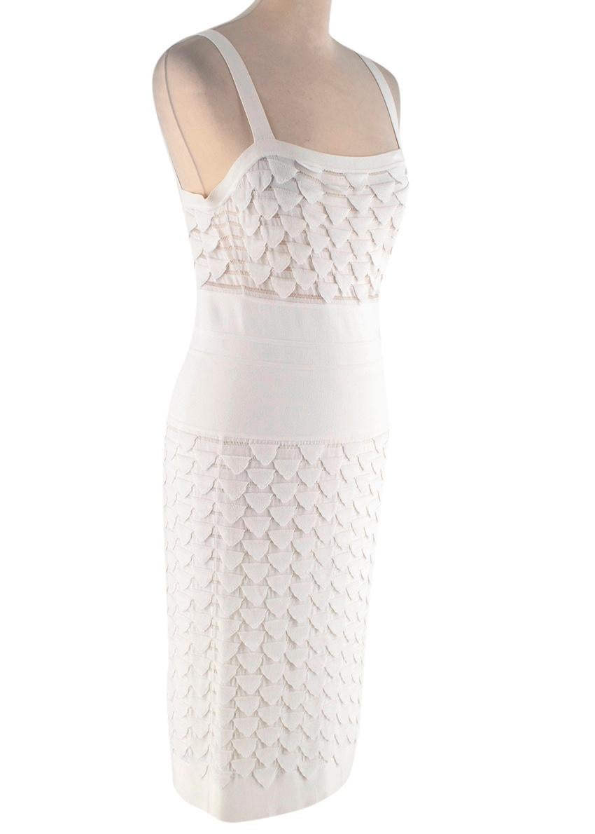 Christian Dior Ivory Knitted Pencil Dress
 

 - Ivory knit pencil dress with thick straps and straight neckline feauturing unsual knitted scales across the bodice and skirt of the dress, interspersed with a plain knit band accentuating the waistline
