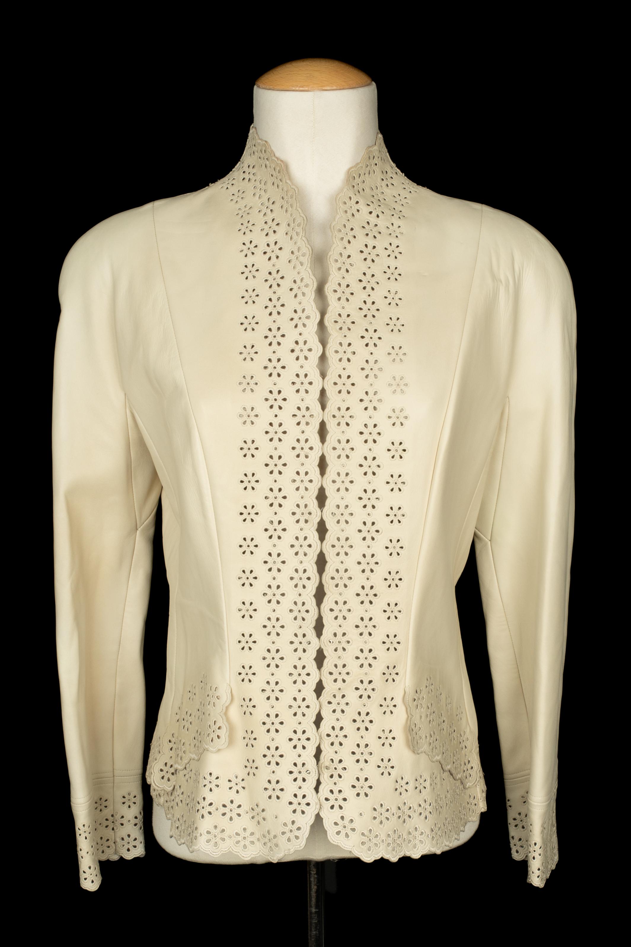 DIOR - (Made in France) Lamb leather jacket with an openwork flower pattern embroidered. Silk lining. Size 44FR indicated. To be mentioned, some marks on the leather. A Collection circa 1998, under the artistic direction of John