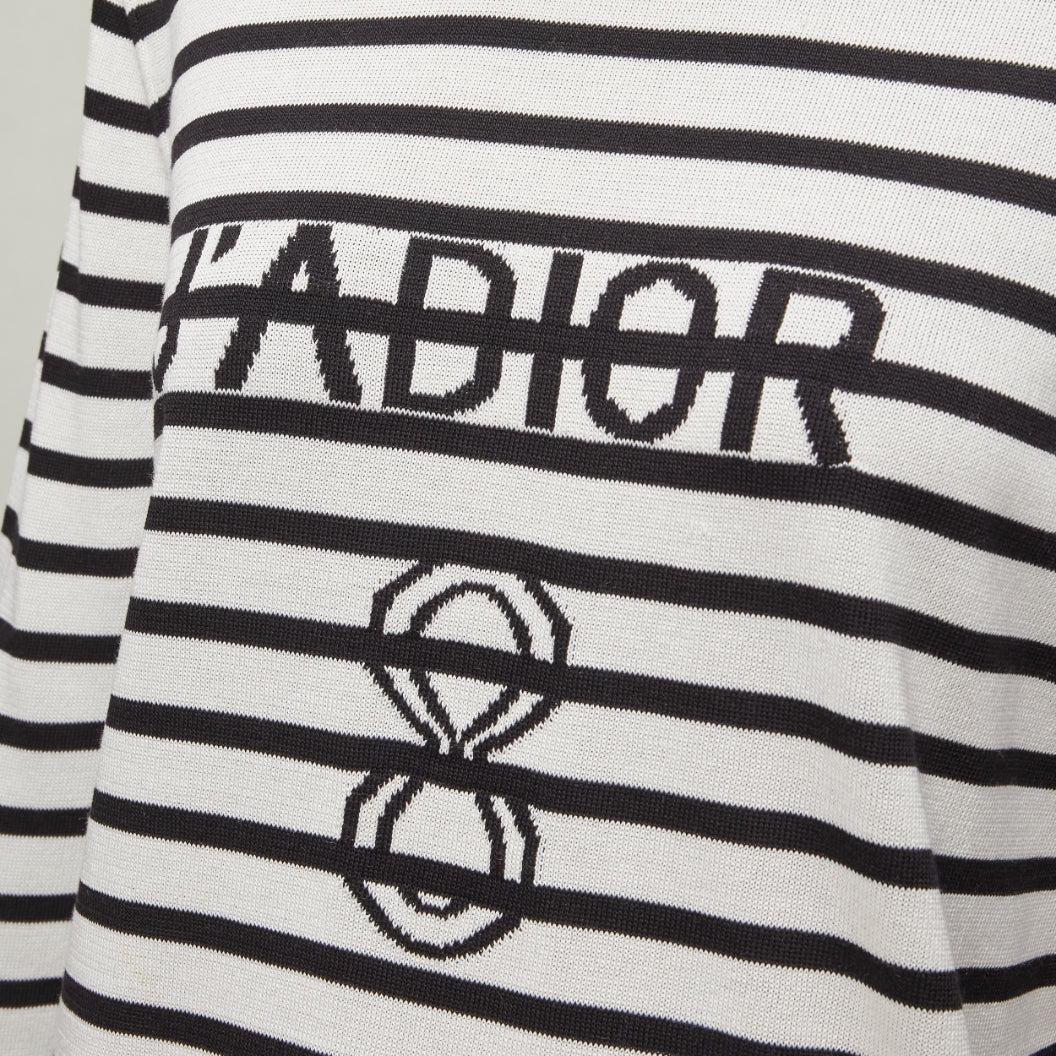 CHRISTIAN DIOR Jadior 8 cream black stripe long sleeve crew sweater FR40 L
Reference: AAWC/A00825
Brand: Dior
Designer: Maria Grazia Chiuri
Model: Jadior 8
Material: Silk, Cotton
Color: Cream, Black
Pattern: Striped
Closure: Pullover
Made in: