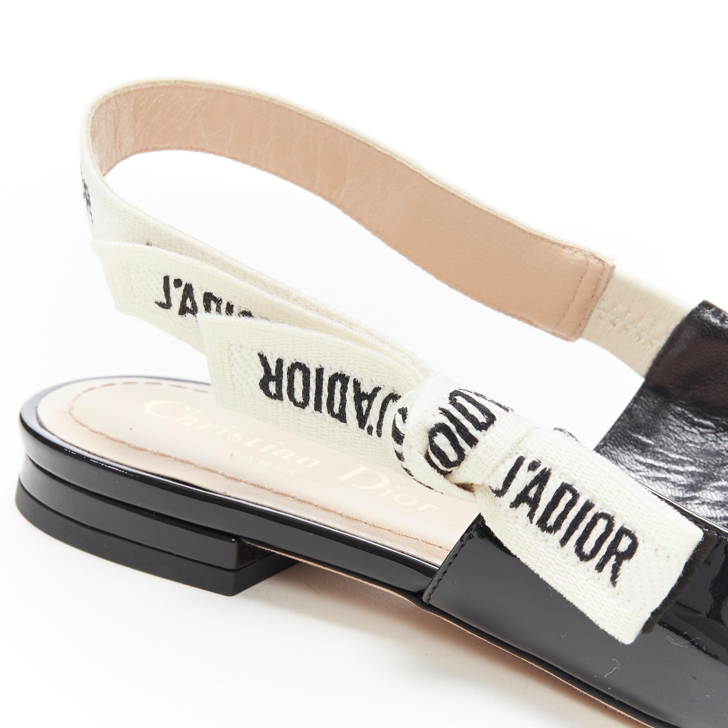CHRISTIAN DIOR J'adior black patent point toe logomania bow slingback flats EU37
Brand: Christian Dior
Designer: Maria Grazia
Collection: 2019
Model Name / Style: J'adior flats
Material: Patent leather
Color: Black
Pattern: Solid
Closure: Sling