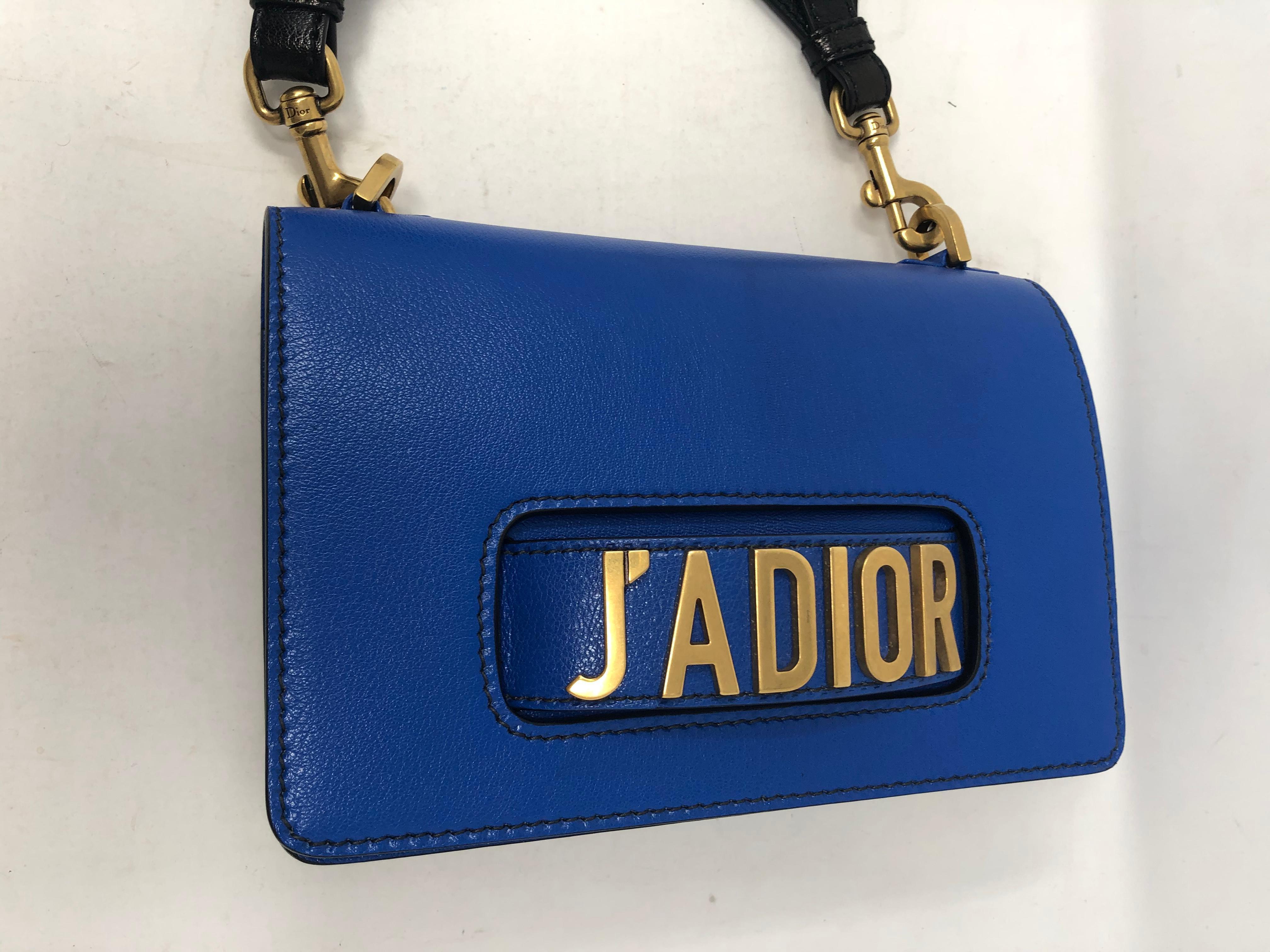 Christian Dior J'adior Blue leather bag with aztec style Dior strap. Rare combination. Strap can be detached and worn for other bags. Blue leather bag can be worn as clutch too. Brand new condition. Guaranteed authentic. 