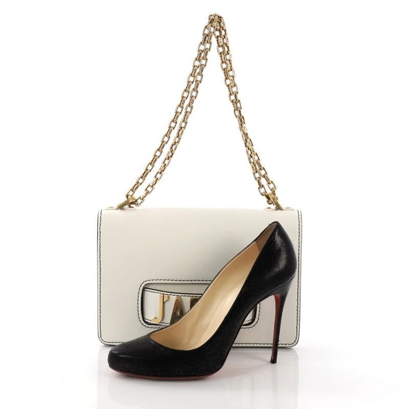 This Christian Dior J'adior Flap Bag Calfskin Medium, crafted from white calfskin leather, features chain link strap, slot handclasp, and gold-tone hardware. Its flap opens to a white microfiber interior with slip pockets. **Note: Shoe photographed