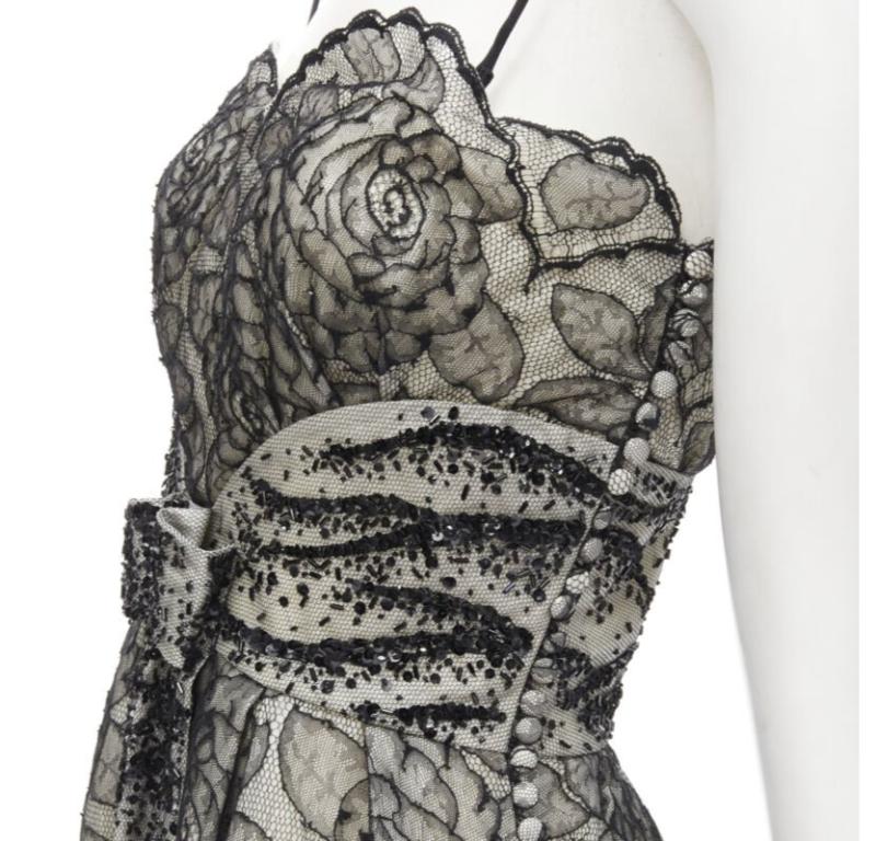CHRISTIAN DIOR JOHN GALLIANO 2011 Runway lace bead embellished bow dress FR36 S
Reference: TGAS/C01236
Brand: Dior
Designer: John Galliano
Collection: Resort 2011 - Runway
Material: Cotton, Blend
Color: Cream, Black
Pattern: Lace
Closure: