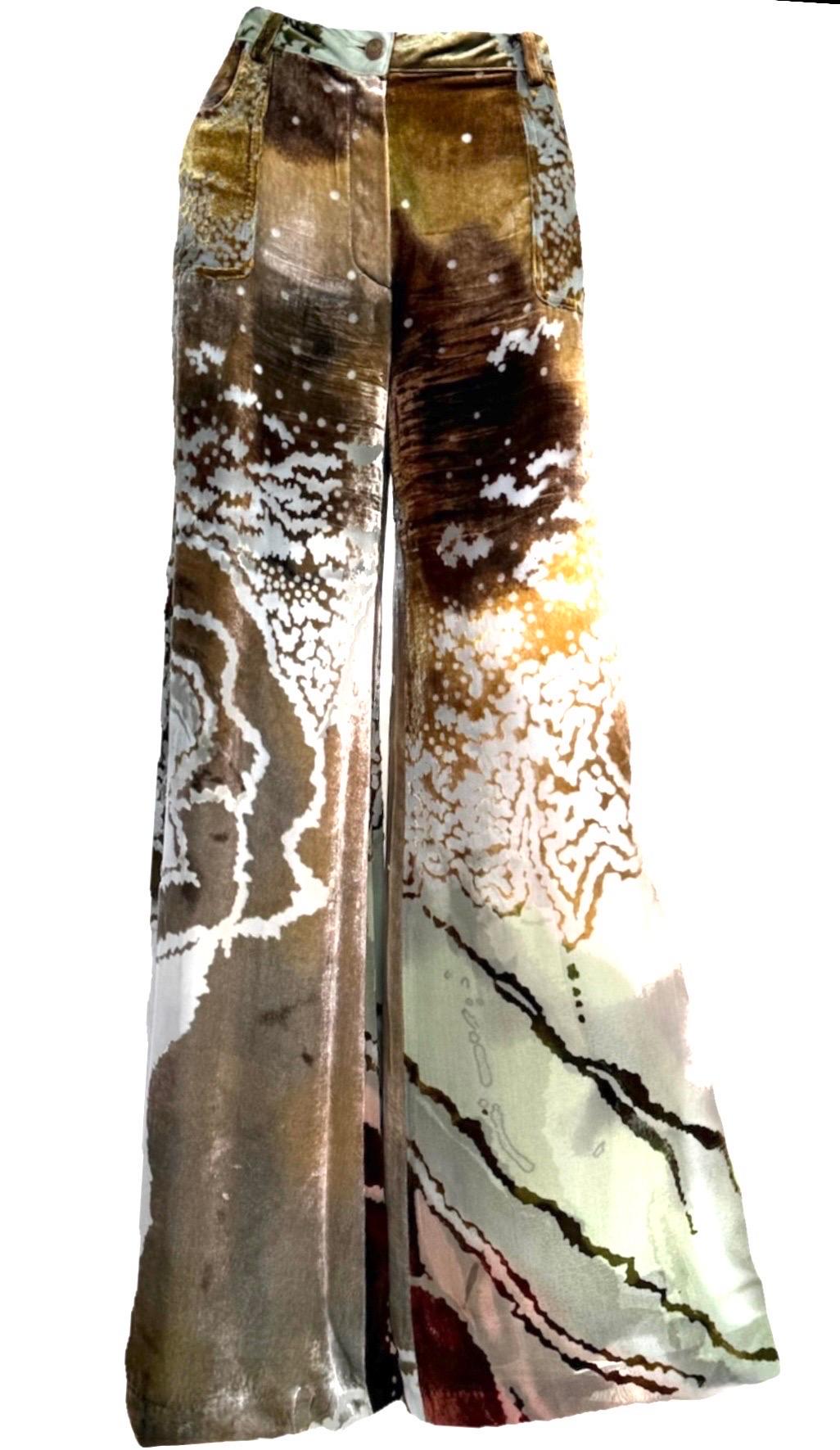 A rare find from Christian Dior’s Fall/Winter 2001 collection under John Galliano, these wide-leg pants combine painterly multicolored semi-sheer silk with richly textured devoré velvet. The high-rise fit and sweeping silhouette create an elongated