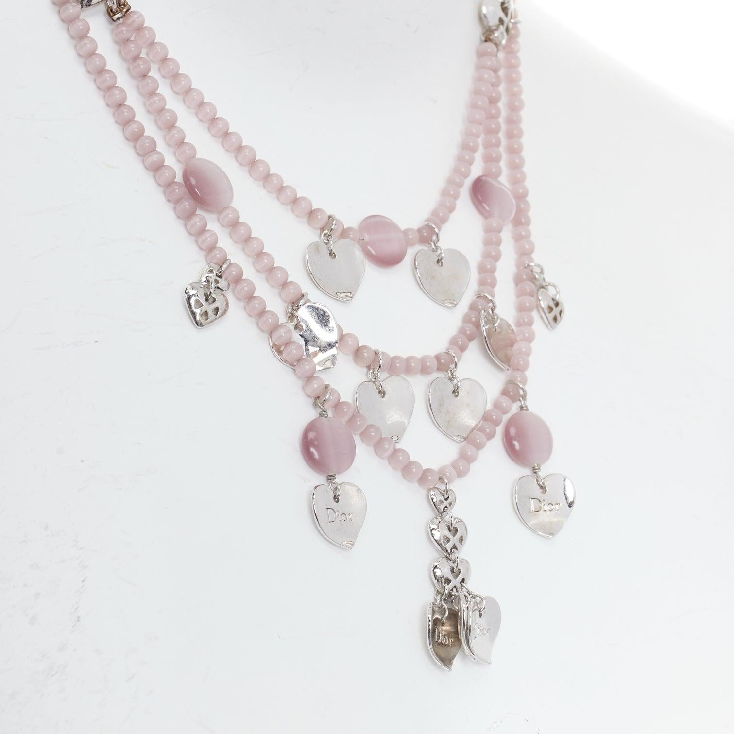CHRISTIAN DIOR John Galliano Vintage silver pink heart logo tiered necklace
Reference: TGAS/E00740
Brand: Dior
Designer: John Galliano
Material: Metal
Color: Pink, Silver
Pattern: Solid
Closure: Lobster Clasp
Extra Details: D droplet at