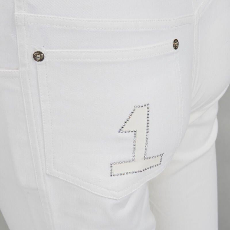 CHRISTIAN DIOR John Galliano Y2K crystal 3D petal cropped flare jeans
Reference: ANWU/A00538
Brand: Dior
Designer: John Galliano
Material: Feels like cotton
Color: White
Pattern: Solid
Closure: Zip Fly

CONDITION:
Condition: Excellent, this item was