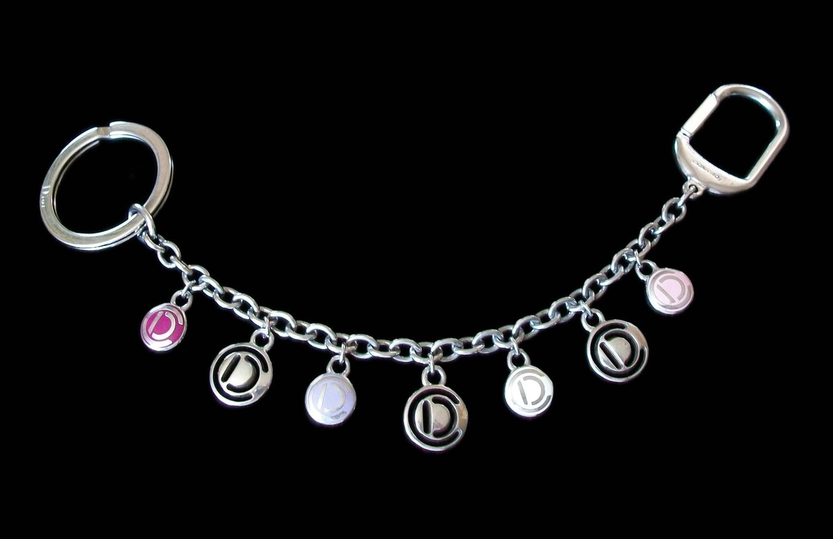 CHRISTIAN DIOR - Elegant designer white metal key chain with multi-color enamel bag charms - fine quality - each charm with the 'CD' logo - three charms pierced metal - four individual charms in red, lavender, white and pink enamel - signed 'Dior'
