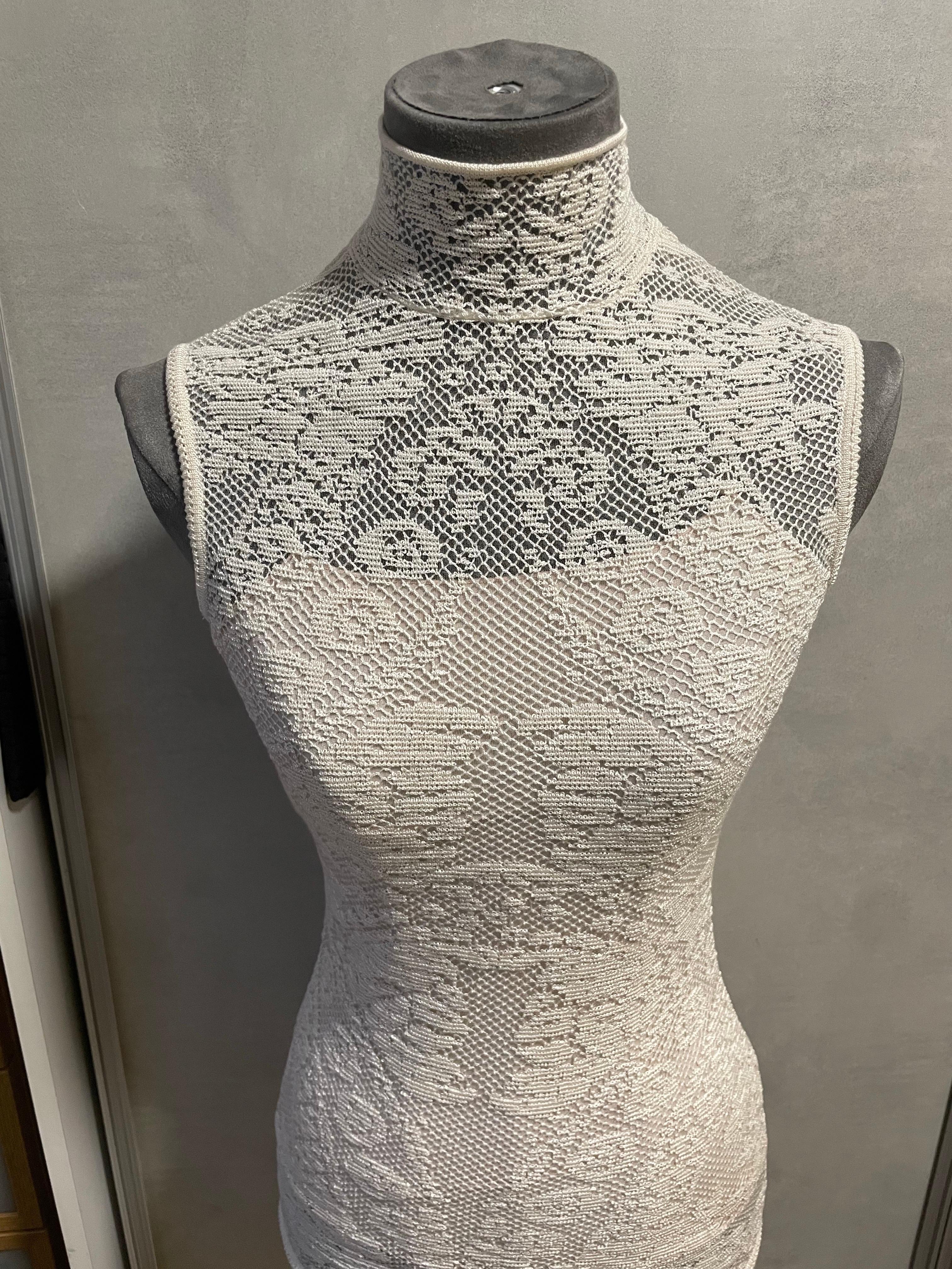 CHRISTIAN DIOR. Magnifica camicetta in pizzo, uncinetto e seta. Collezione in passerella, primavera estate 2015. In perfette condizioni. Taglia 36 francese.