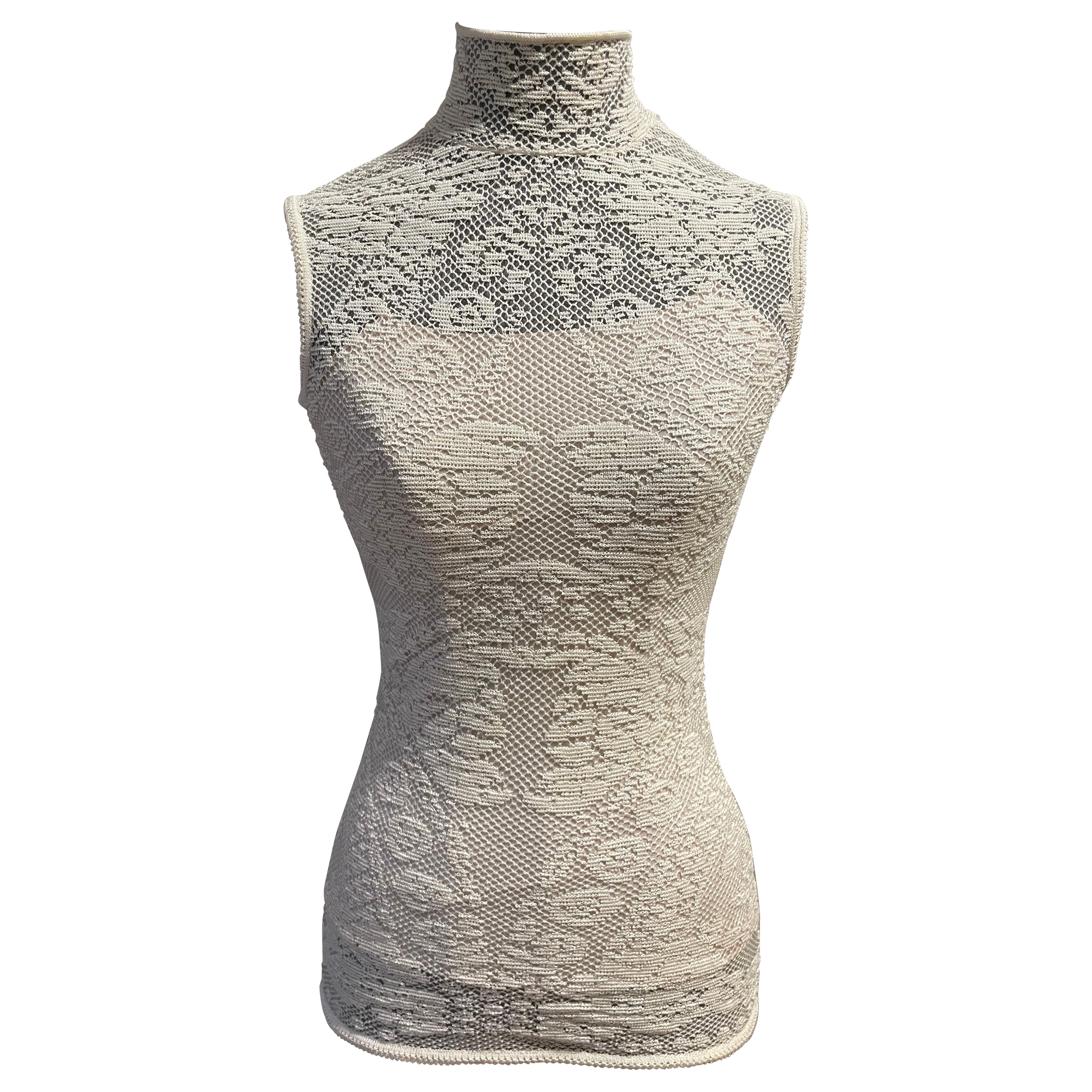 Camicetta in pizzo, uncinetto e seta di Christian Dior