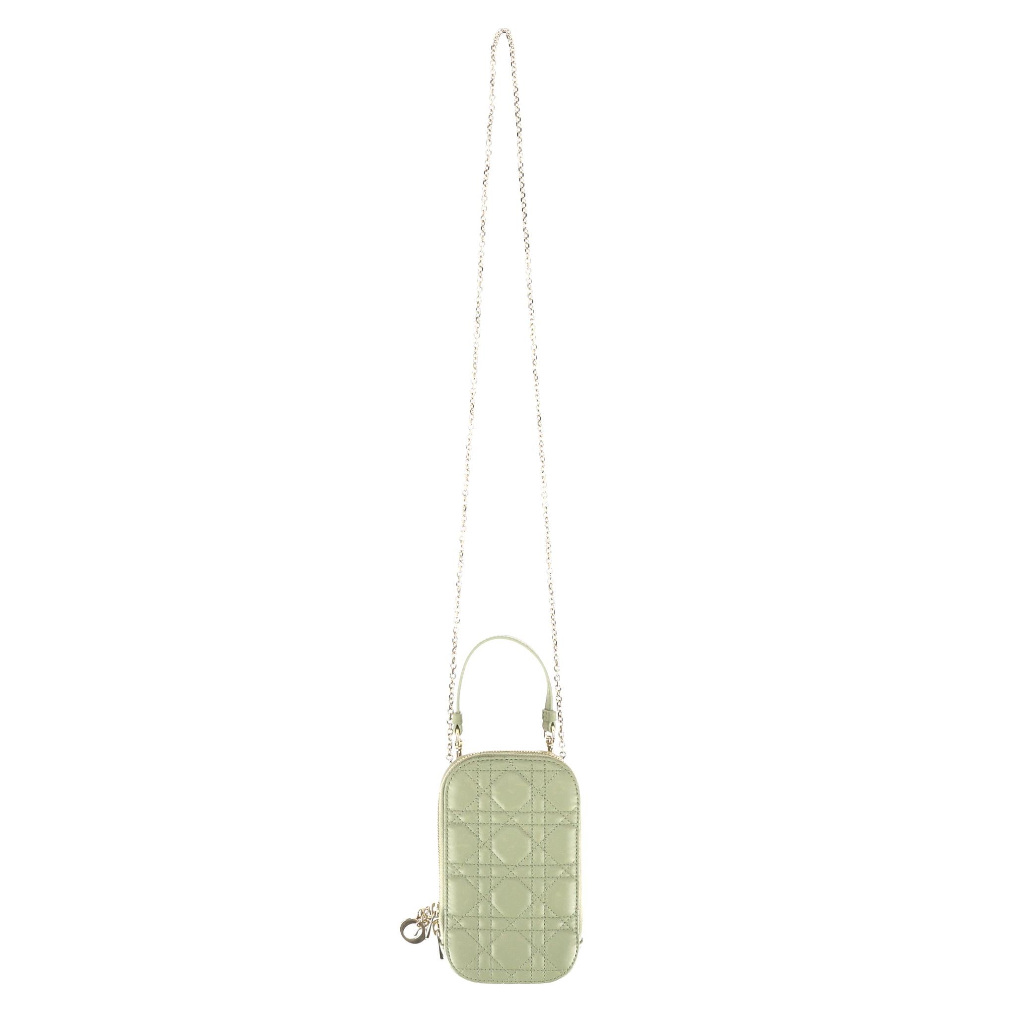 Christian Dior Lady Dior Call'in Dior Cannage Lambskin Phone Holder

Sage green phone holder crafted from Cannage lambskin featuring Dior's signature quilted pattern.

Designed with gold hardware and detachable D.I.O.R. charms.

Having removable top