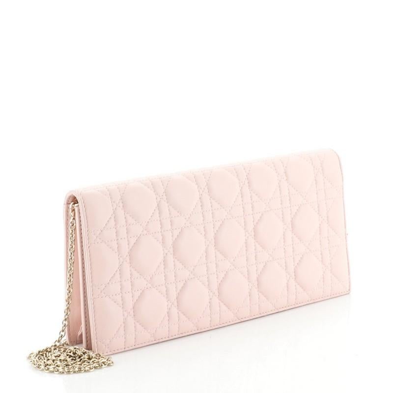 Christian Dior Lady Dior Chain Convertible Clutch Cannage Quilt Leather Long 

Estimated Retail Price: $1,250
Condition: Very good. Moderate wear on base and flap corners, small glue stains on base corners,
Accessories: With Strap
Measurements: