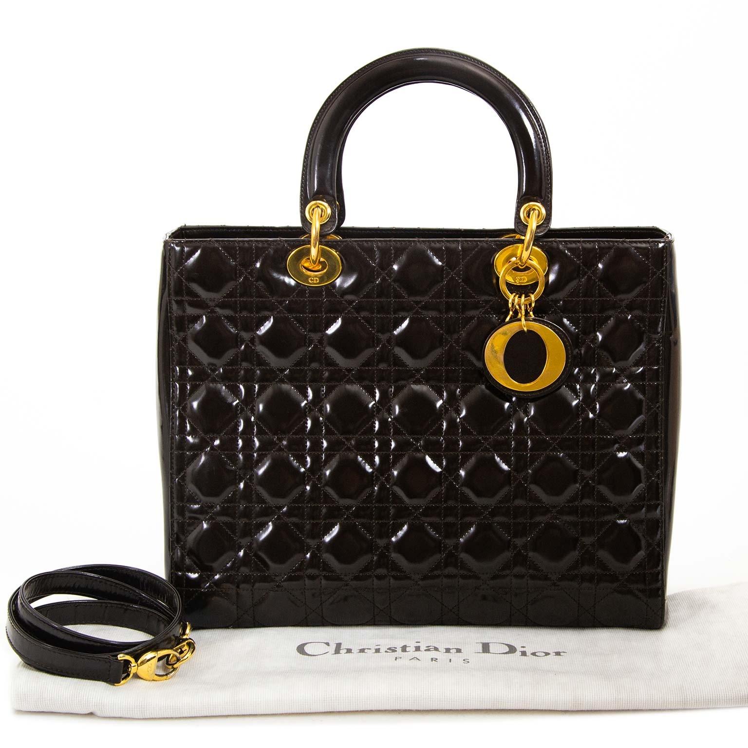 Very good condition 

Christian Dior Lady Dior Large Brown Handbag

The Lady Dior, a true classic with its clean lines and design elements. 
This beauty is crafted from patent brown leather finished with gold-tone hardware. 
You can wear this