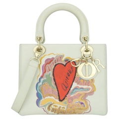 Sac moyen Lady Dior Christian Dior en cuir de veau blanc cassé imprimé Amour, 2018