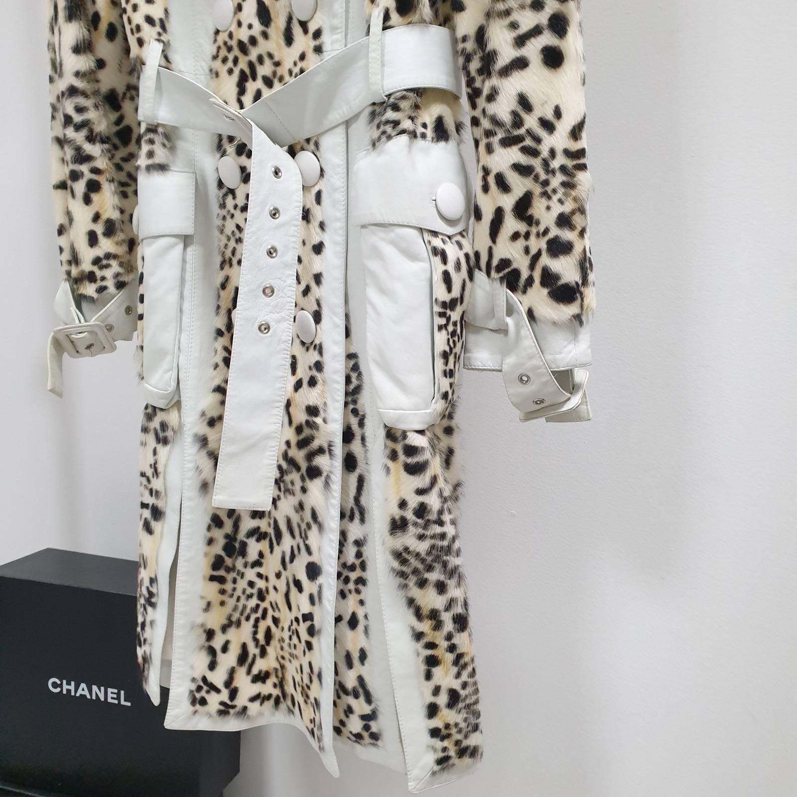 Christian Dior Lynx Print Leather and Goat Fur Coat
 - White and Black Coat
 - Lynx Spotty Printed
 - White lambskin leather
- Goat details
 - Wide lapel, double breasted
- Dual side pockets
- Leather belt at waist
 - Belted sleeves
- Silk