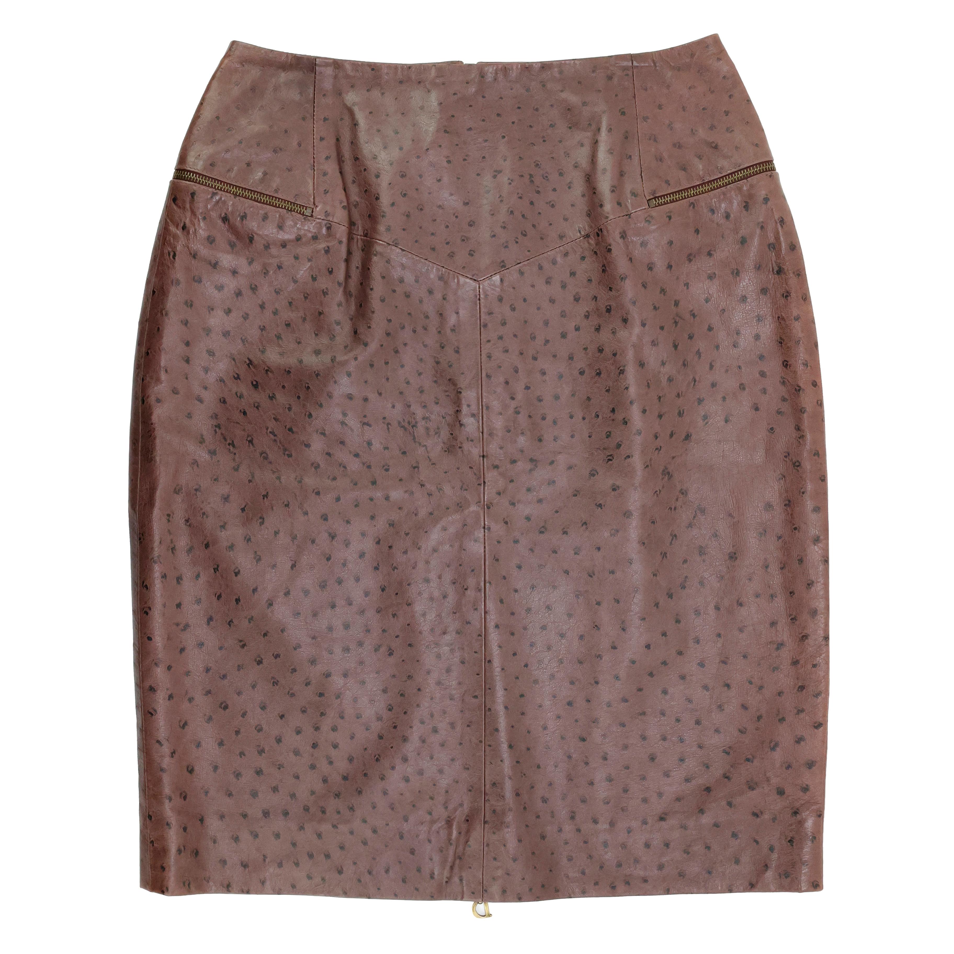 Christian Dior by John Galliano 2000s leather skirt color brown, silk lining, gold CD slider charm, size 42 FR.

Condition:
Really good.