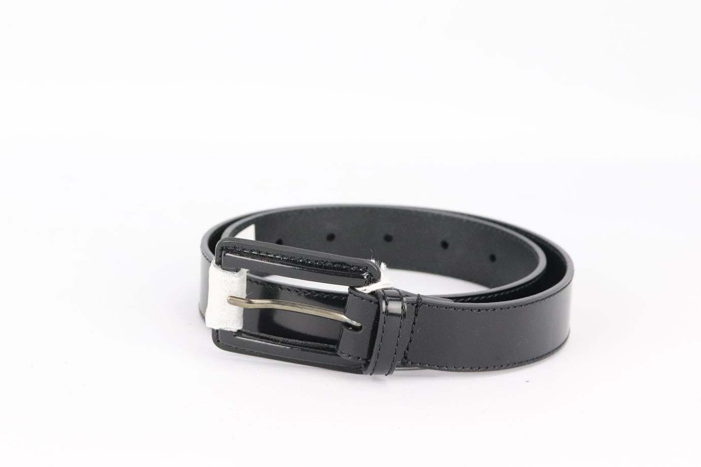 Christian Dior leather waist belt. Black. Buckle fastening at front. 100% Leather. Comes with dustbag. Size: 65 cm. Min. Length: 25.2 in. Max. Length: 29.2 in. Width: 1 in. New with tags
