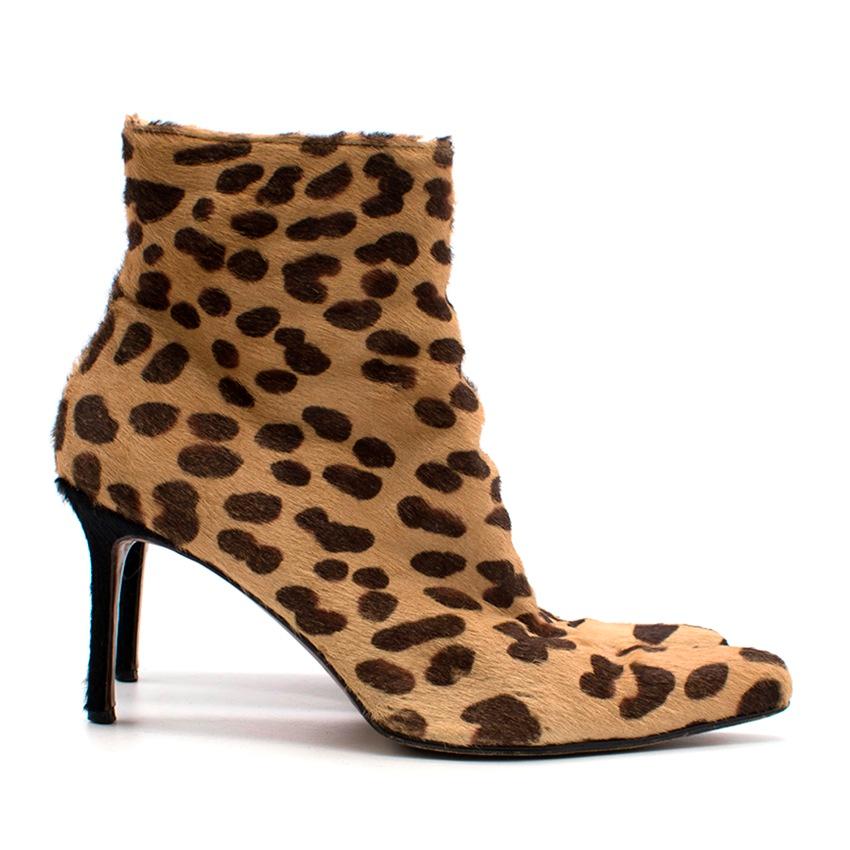 Pointed ankle boots with Ponyhair leopard print and a concealed side zipper.

Please note, these items are pre-owned and may show signs of being stored even when unworn and unused. This is reflected within the significantly reduced price. Please