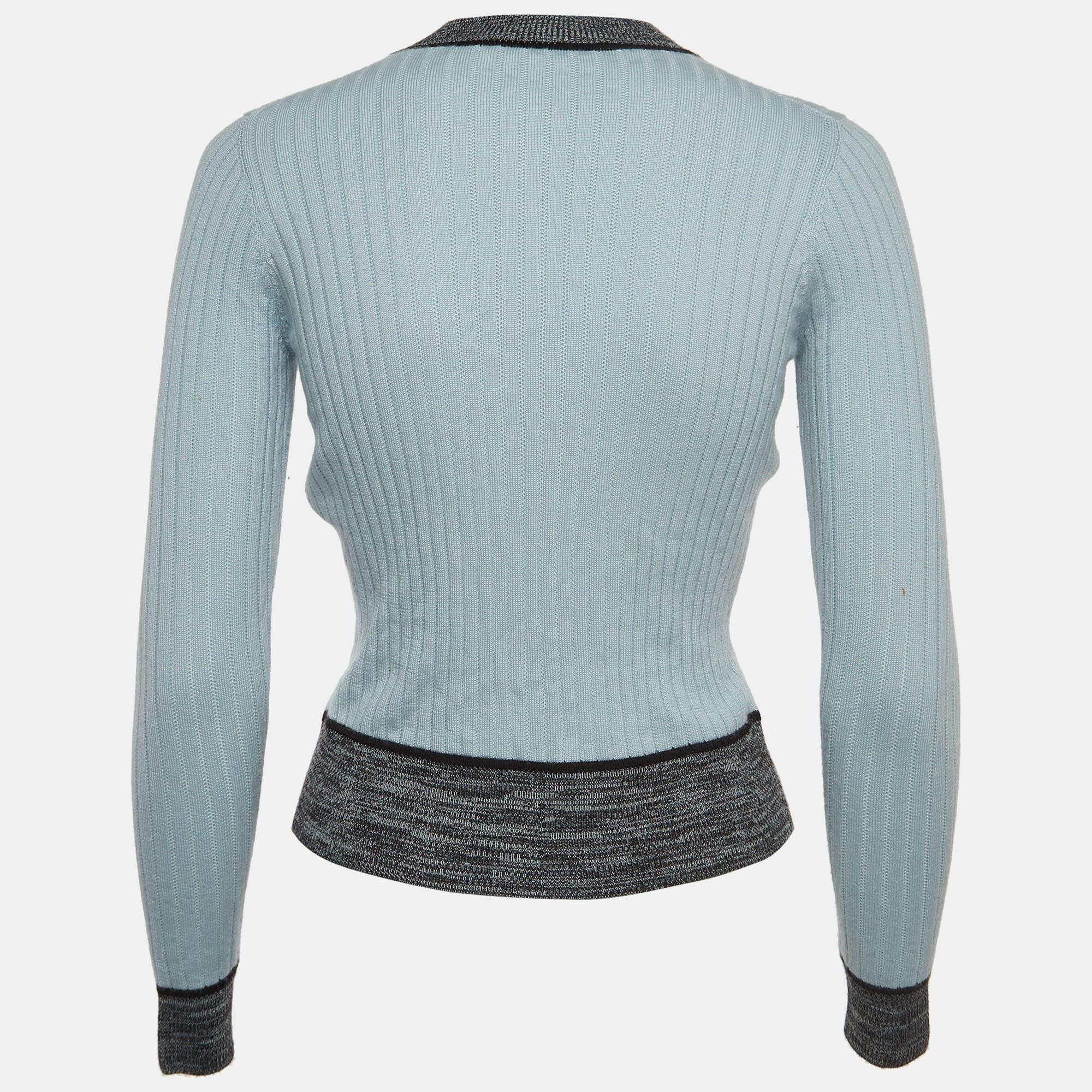 Wrap yourself in warmth and style with this Dior light blue sweater. Meticulously crafted for comfort and fashion, it epitomizes timeless sophistication. Each stitch reflects quality, making it an essential piece for every wardrobe.

