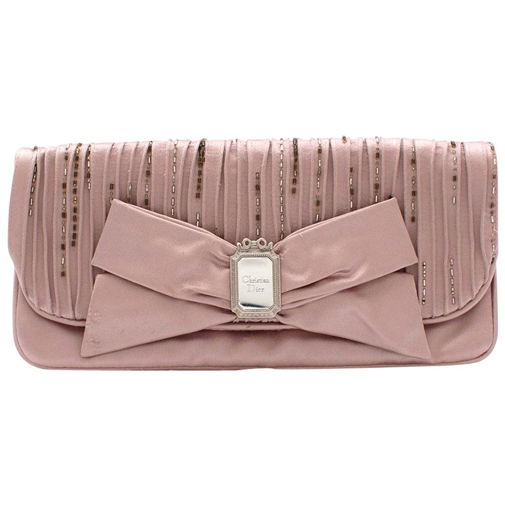 mauve clutch bag