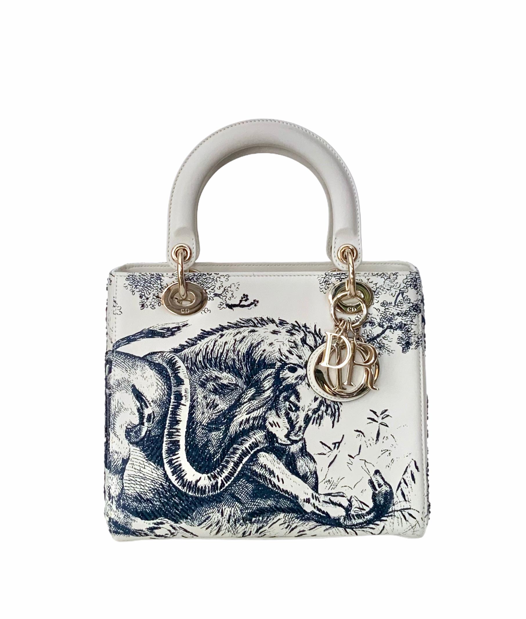 This Limited Edition Lady Dior bag is crafted in a delicate neutral calfskin leather and the Toile de Jouy print (dating from 1947 in the house of Christian Dior) has been enhanced with beadings. 
Another beautiful piece designed by Maria Grazia