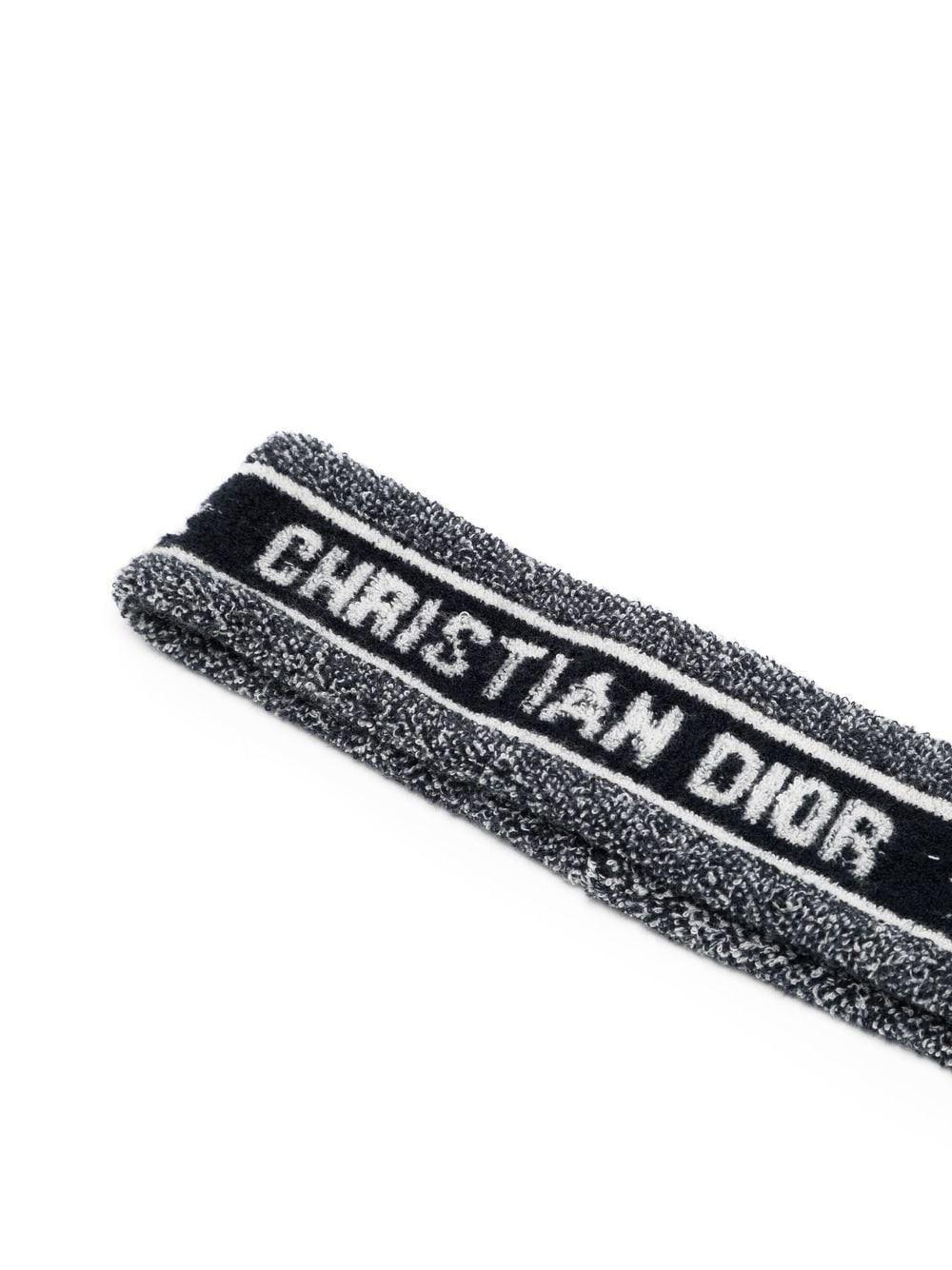 Perfect for a chic Tennis look, this terry Dior sweatband is both practical and a collector's item. This piece features terry cloth all over with the Christian Dior logo at the front.

Colour: Blue & White

Size: Onesize

Composition: Cotton 80%,