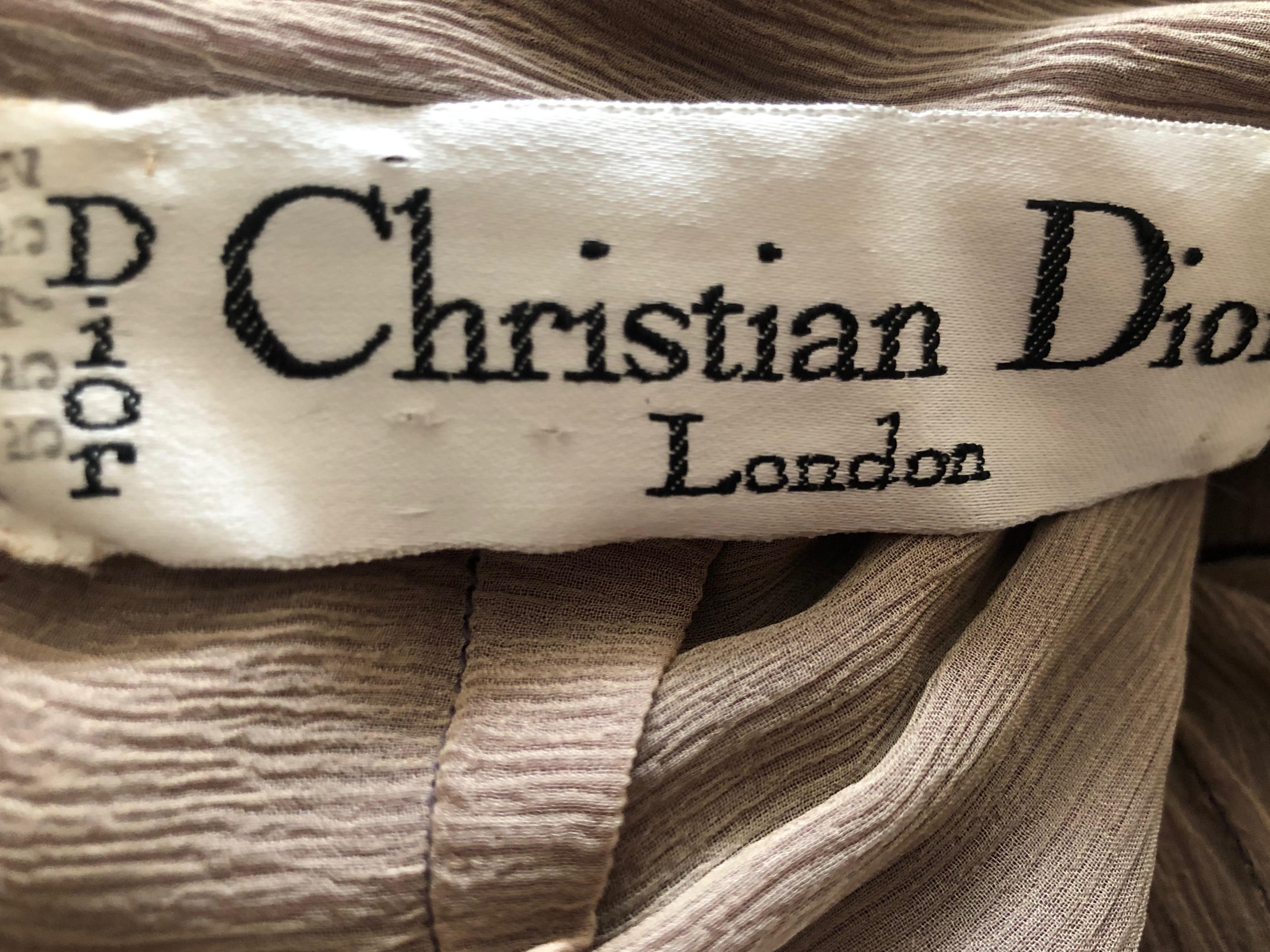 Christian Dior London 1960's Numbered Haute Couture Dress with Lesage Embellished Hemline.
So pretty, the hem is entirely embellished in beads , crystals and embroidery.
The label is numbered, it is Haute Couture.
Bust 34