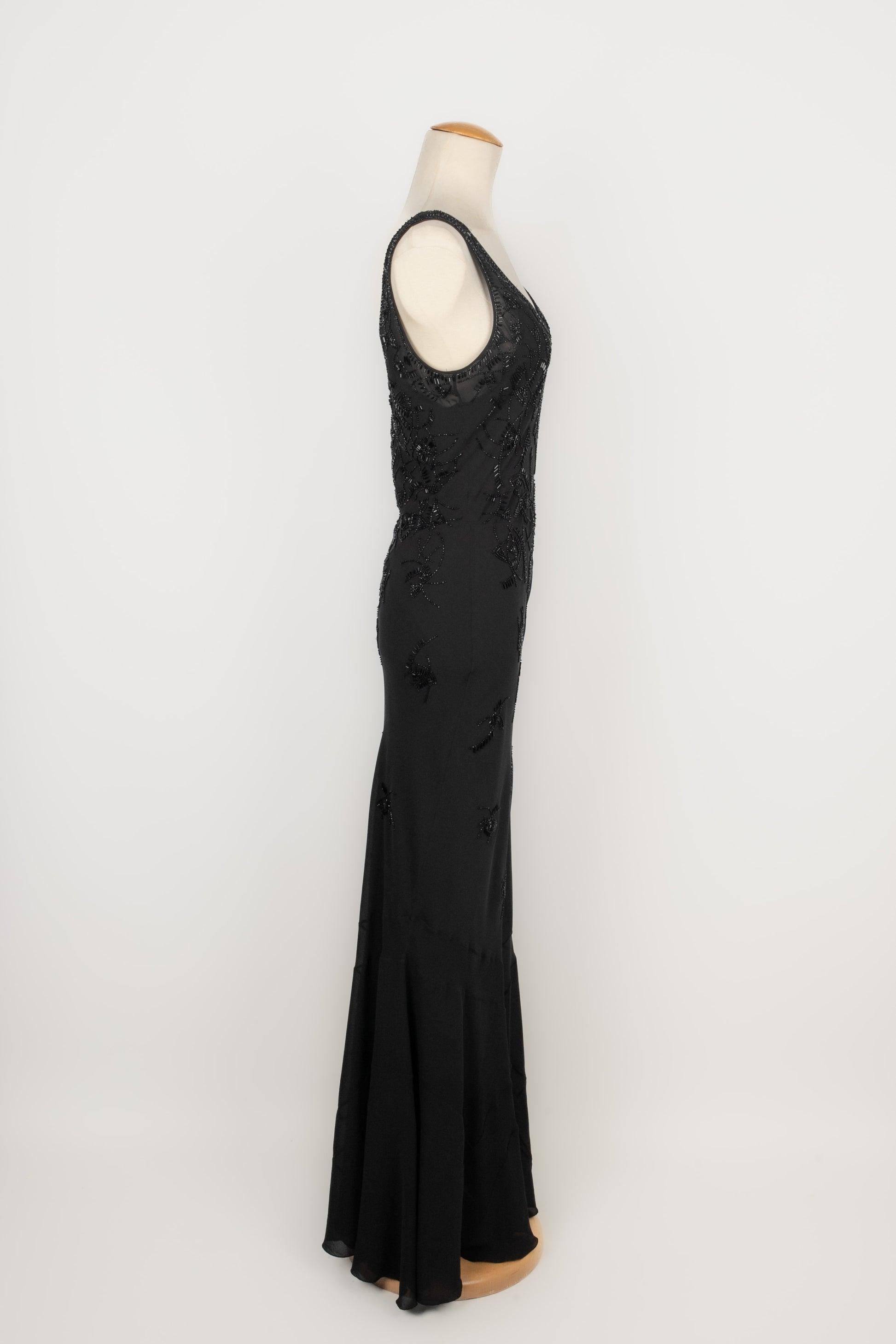Christian Dior - (Made in France) Long silk dress embroidered with black pearls. Size 40FR. 2000 circa Collection, under the direction of John Galliano.

Additional information:
Condition: Very good condition
Dimensions: Chest: 44 cm - Waist: 40 cm