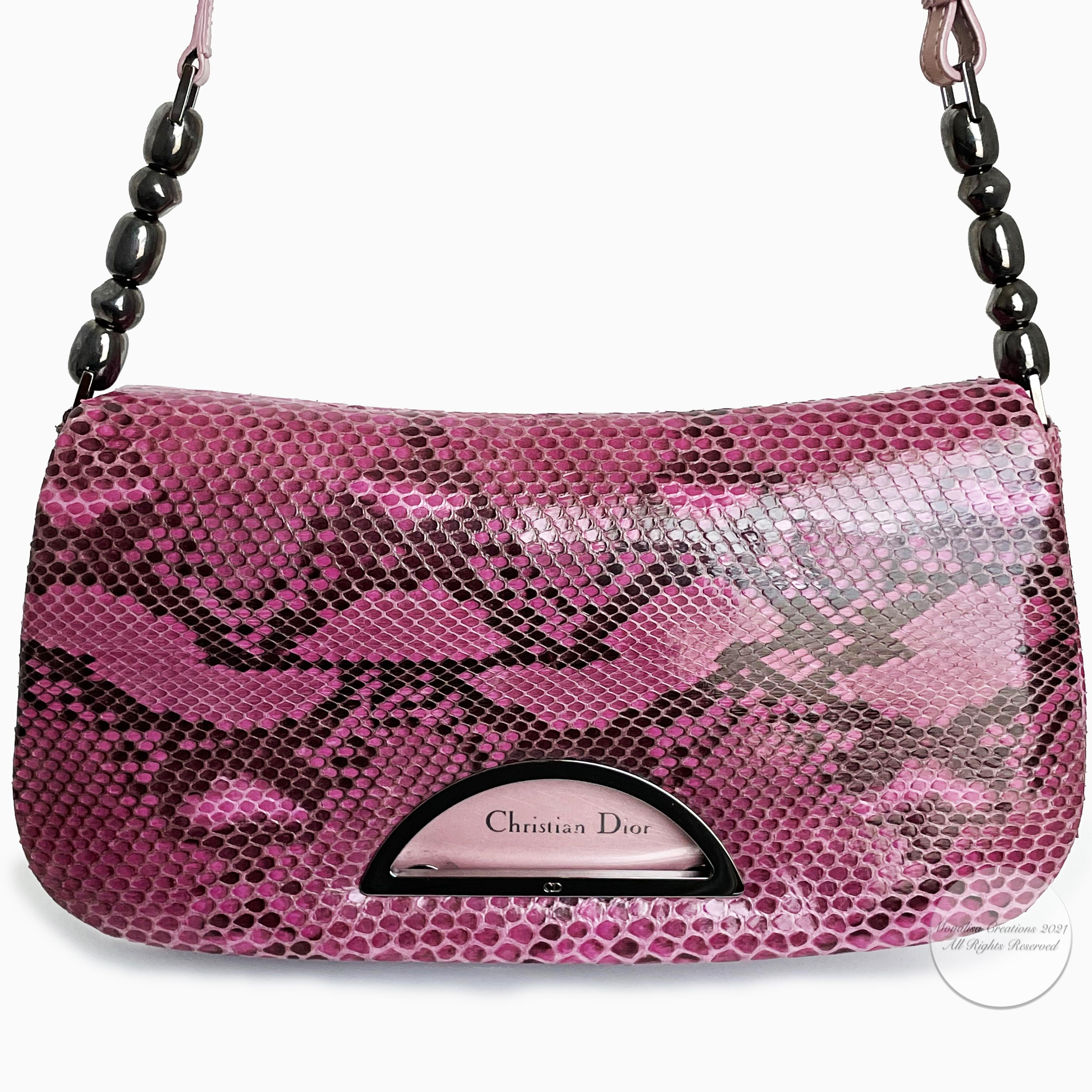 Authentic, preowned Christian Dior Malice flap bag in pink python and leather, likely made in the 2000s.  Made from pink exotic python and pink leather, it features silver hardware and beading detail on the shoulder strap.  A chic little bag in a