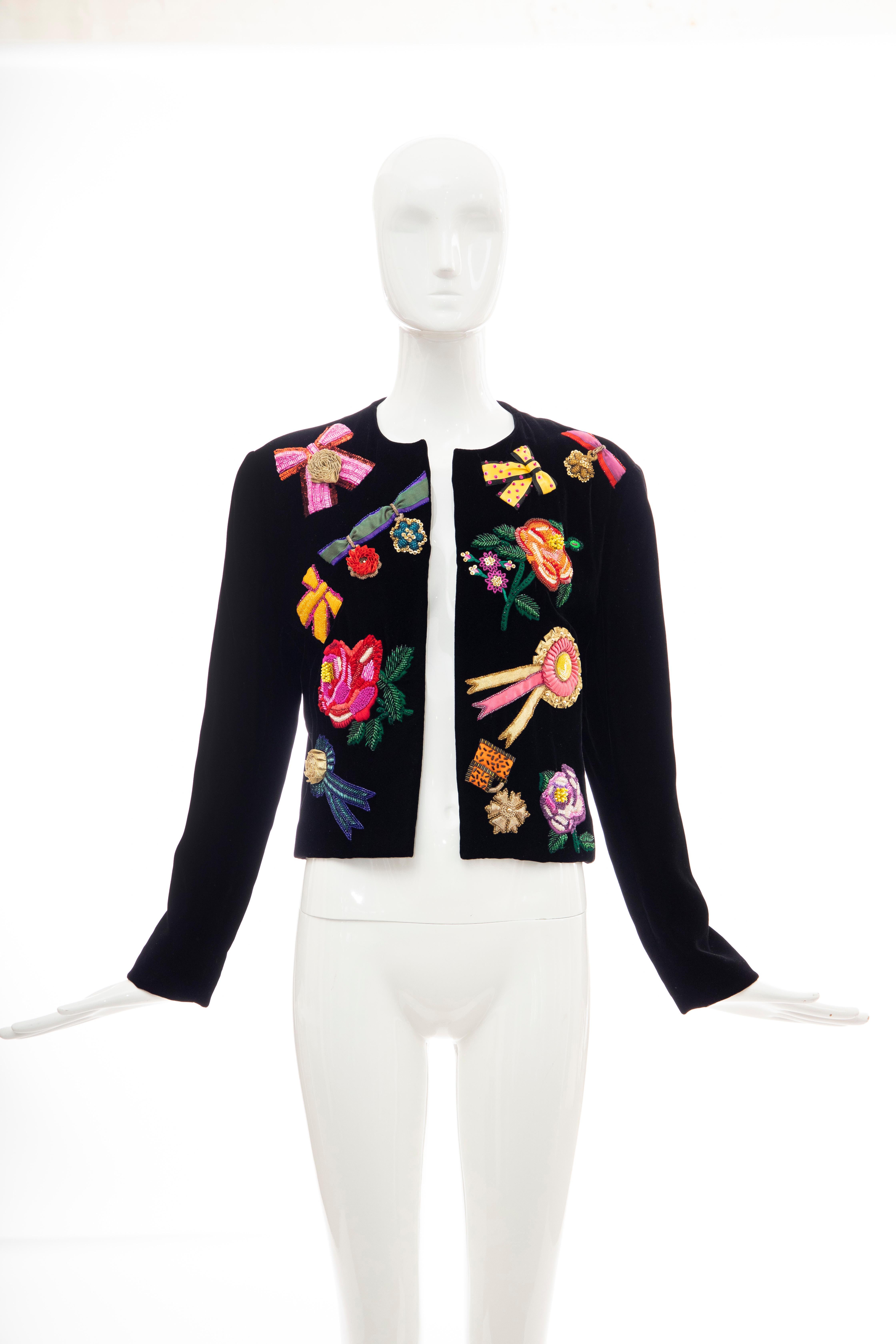 Christian Dior by Marc Bohan, Fall 1988 Runway black velvet open front evening jacket with fancy bows, flowers and beaded ribbon embroidery. 

No Size Label

Bust: 36, Waist: 32, Shoulder: 17, Length: 21, Sleeve: 28.5
