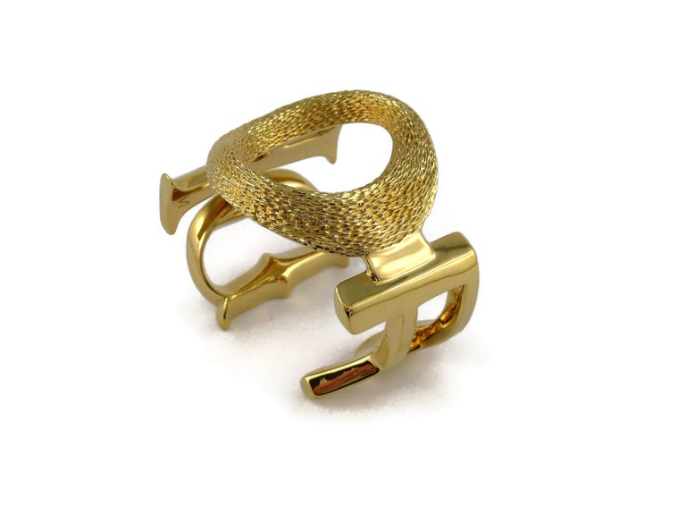 Christian Dior Massive Gold Toned Logo Cuff Bracelet Size M at 1stDibs