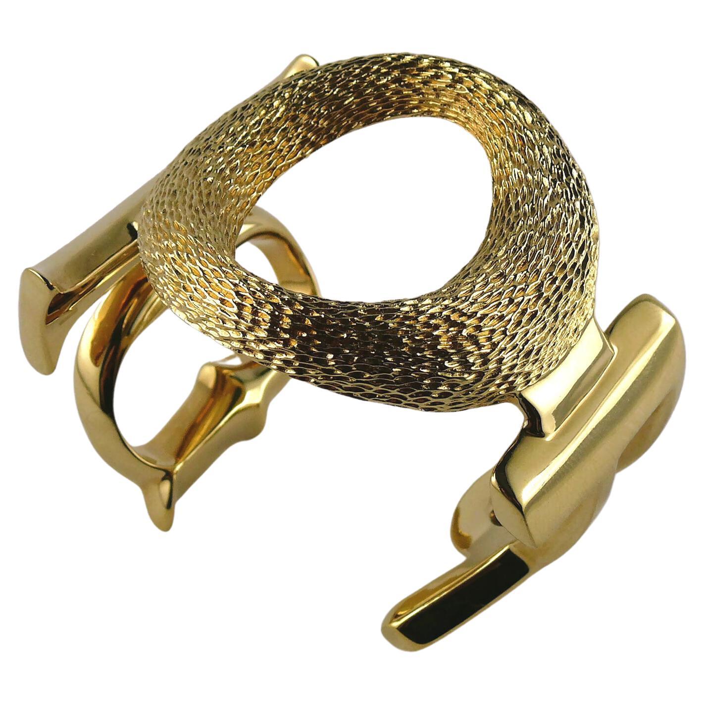 Christian Dior Massive Gold Toned Logo Cuff Bracelet Size M For Sale