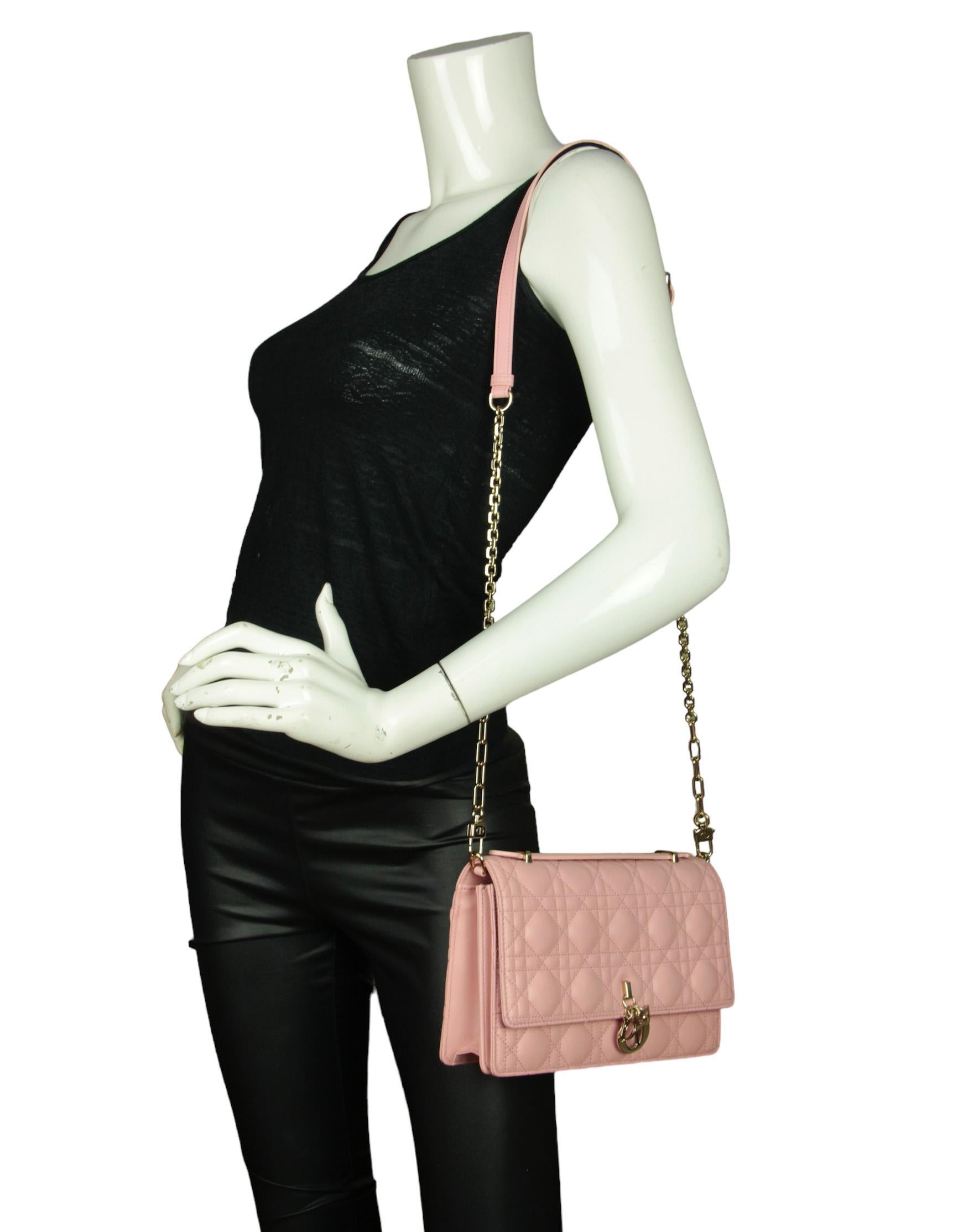 Christian Dior Melocoton Pink Cannage Lambskin Miss Dior Top Handle Bag. Bag can be worn as clutch, top handle, or with shoulder strap. 

Made In: Italy
Year of Production: 2023
Color: Melocoton Pink
Hardware: Pale goldtone
Materials: Lambskin