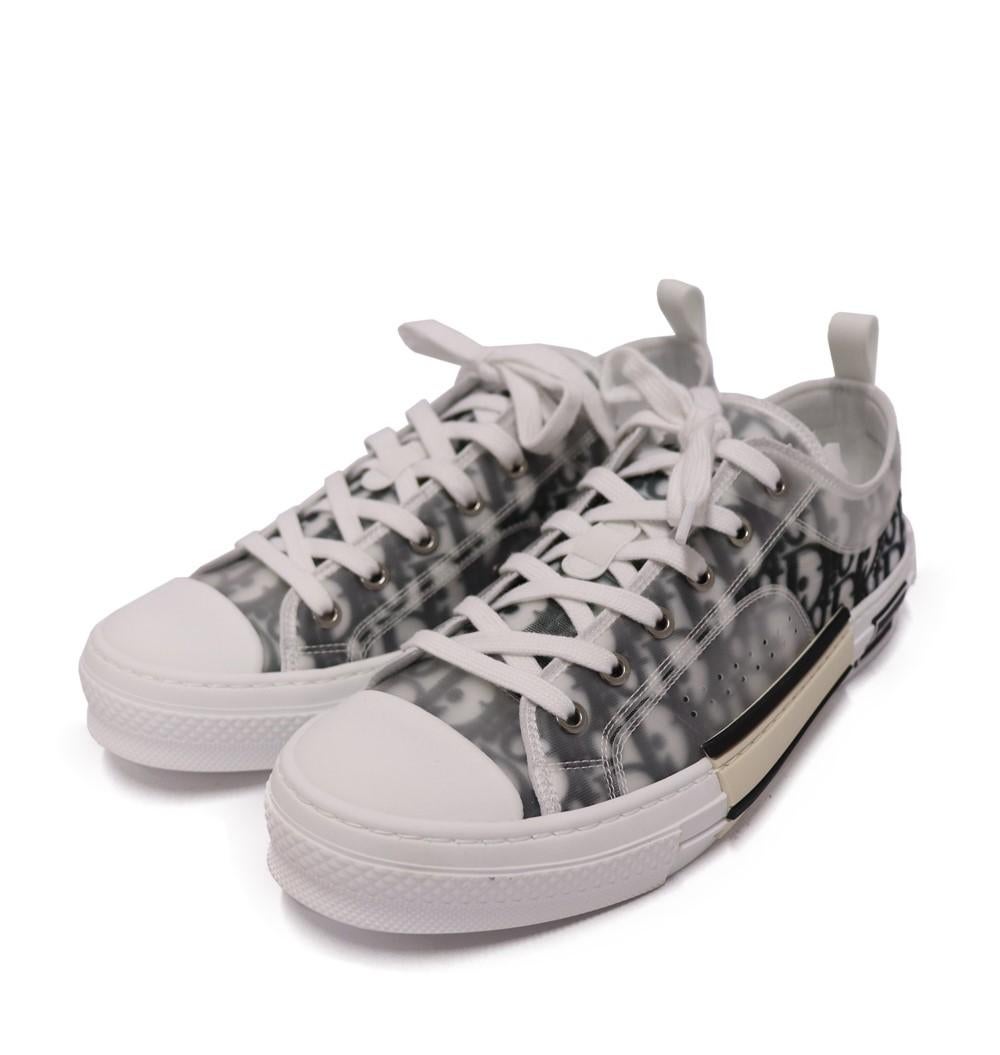 Christian Dior Men's Oblique Net And PVC B23 Low Top Sneakers, Features round toe shape and lace up style.

Material: PVC
Size: EU 43.5
Overall Condition: Excellent
Interior Condition: Like New
Exterior Condition: Like New
*Includes original box
