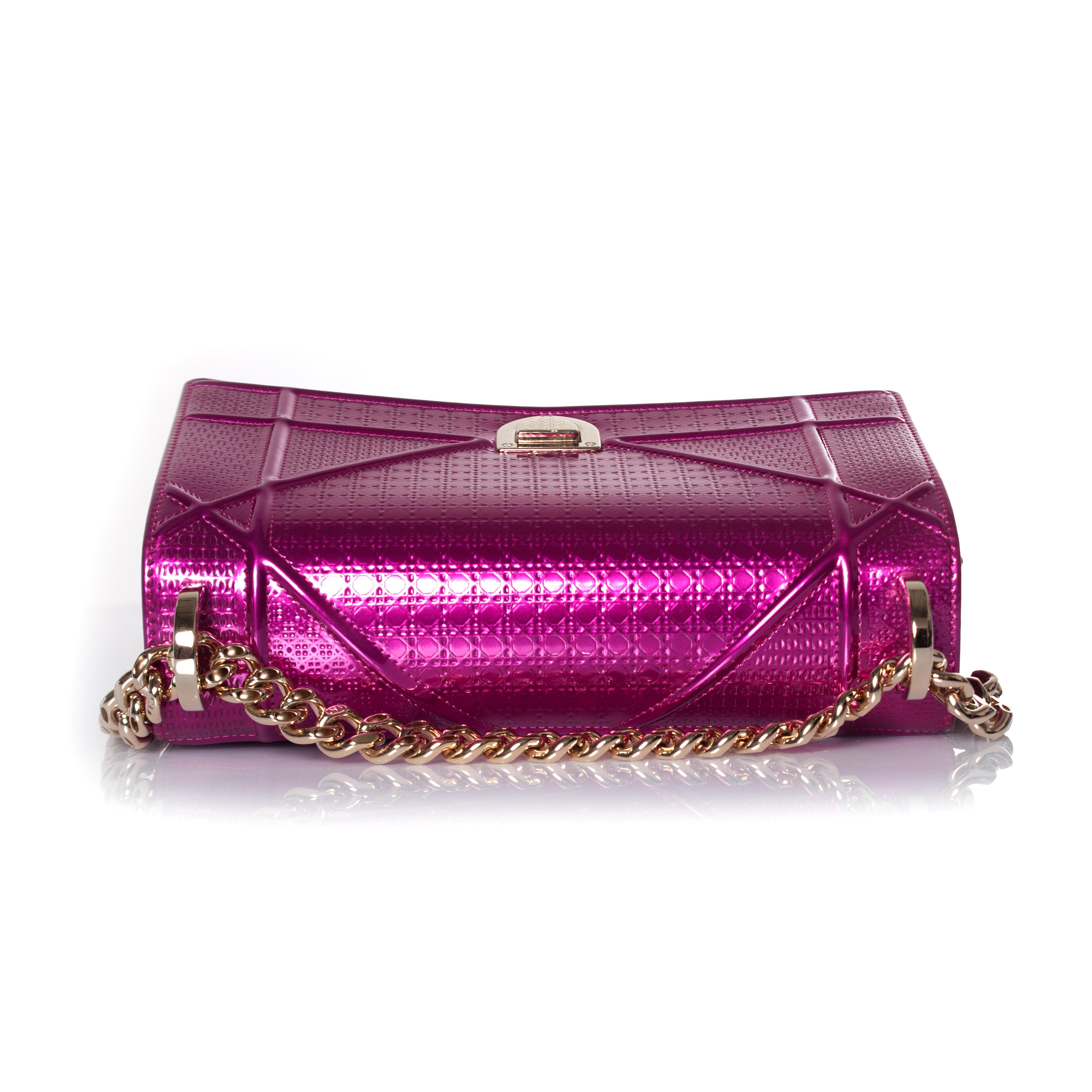Christian Dior, Metallic small cannage embossed Diorama flap bag in fuchsia patent leather. This item is in excellent condition and comes with receipt, dustbag, card, booklet and box.

• CONDITION: excellent condition 

• SIZE: small 

•