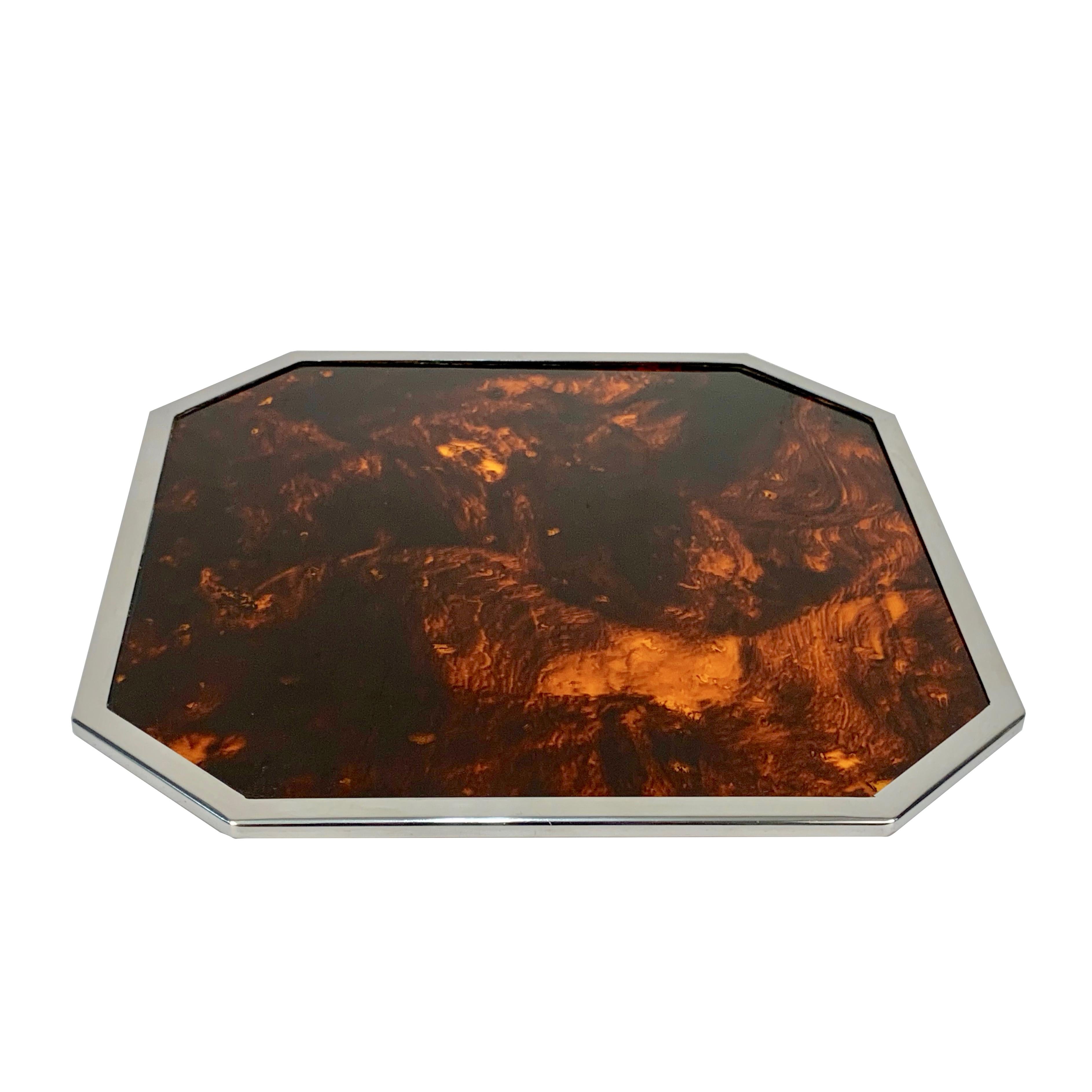 Wonderful midcentury piece of serveware, produced in Italy during the 1970s.

Its design is attributed to Willy Rizzo for a Christian Dior home production.

It is an iconic metal-framed tortoiseshell and Lucite serving tray or platter that will