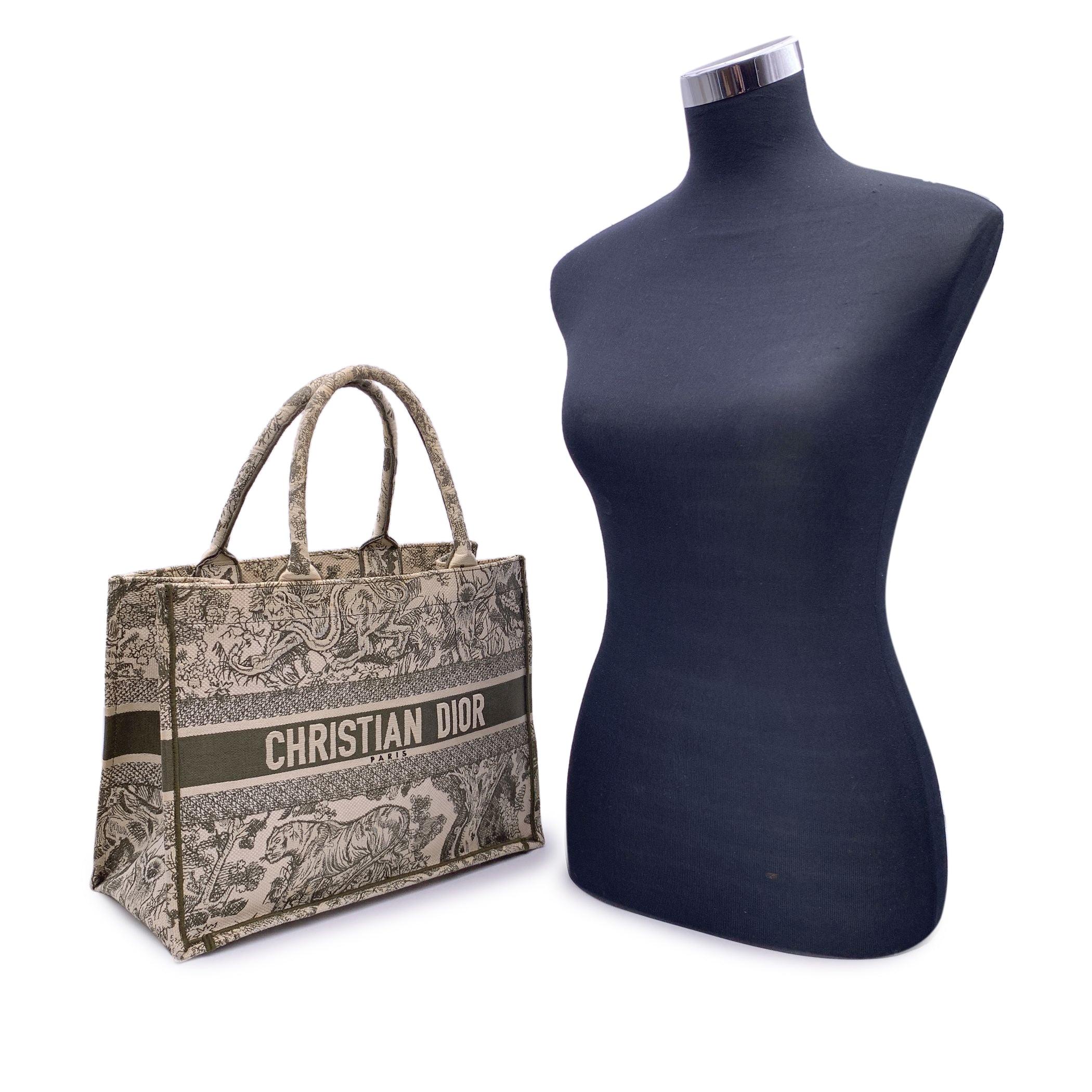 This beautiful Bag will come with a Certificate of Authenticity provided by Entrupy. The certificate will be provided at no further cost Iconic Christian Dior military green jacquard Toile de jouy 'Book Tote', Medium size. This is the Medium size.