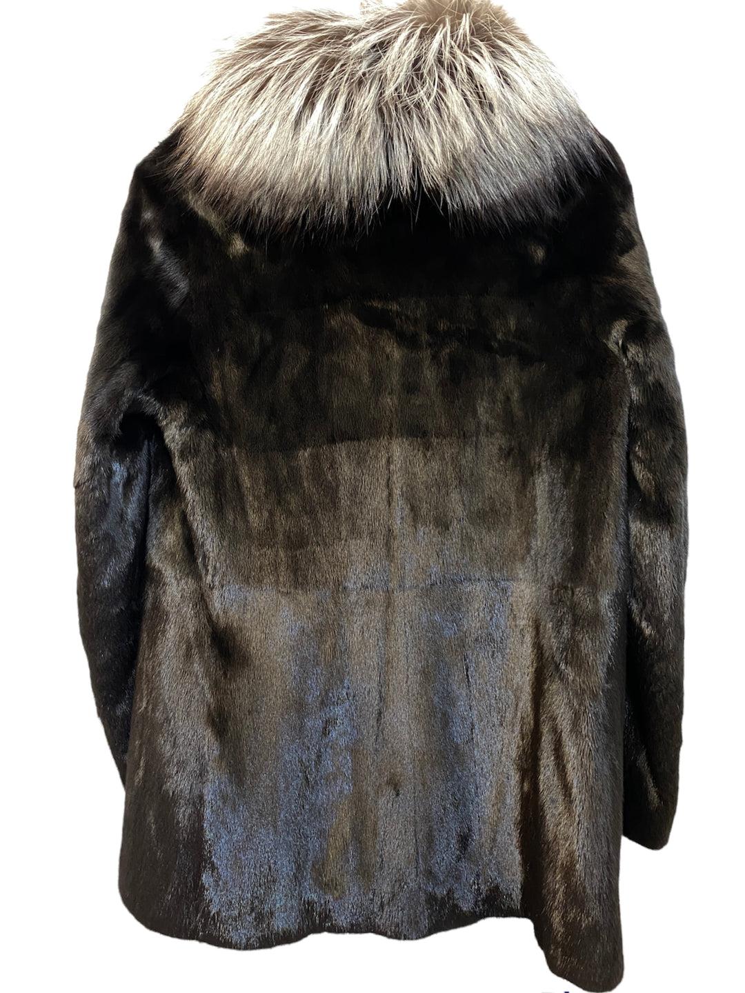 Christian Dior Mink Coat

Condition: Very excellent
Colour:  black
Size: 38
Material: 100% mink, 100% fox fur on collar

This Christian Dior mink coat is a stunning and elegant piece that is perfect for any occasion. Made from high-quality mink fur,